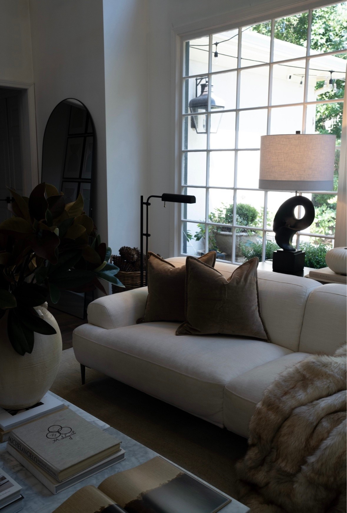 Okay, I’m obsessed with how this living room came together! The sunlight pouring through those big windows makes the whole space glow, and the mix of soft textures with warm, earthy pillows is exactly what fall vibes should feel like. Add in the sculptural lamp and modern details, and it’s giving cozy and sophisticated all at once. This is officially my new favorite spot to curl up and relax!! 

 

#LTKSeasonal #LTKFallSale #LTKStyleTip