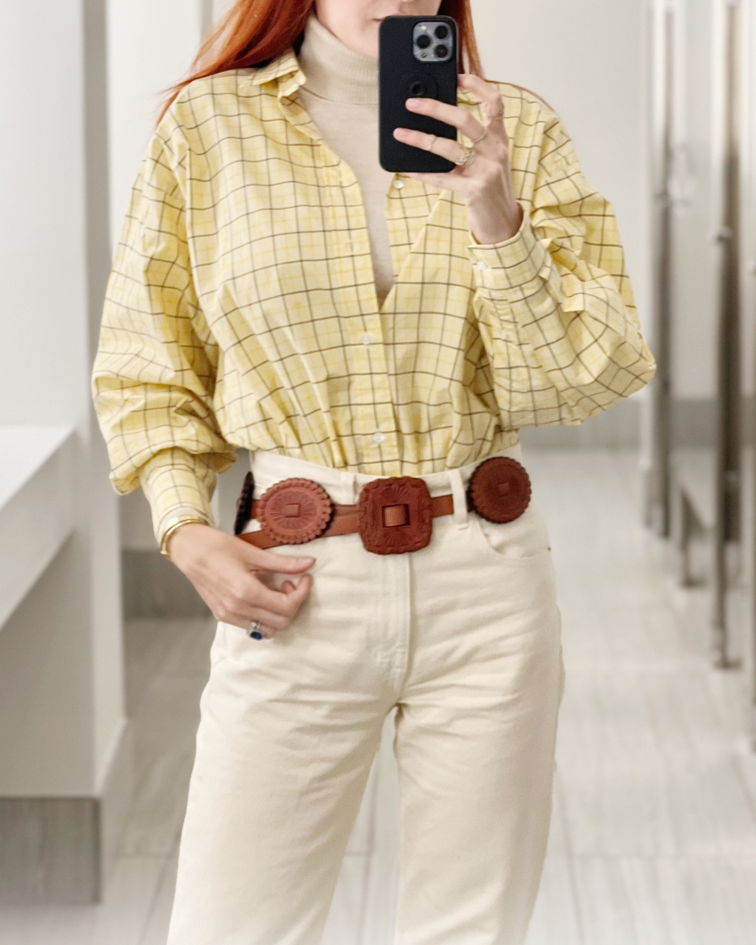 This classic look is made up of wardrobe builders- cream denim, a wool turtleneck (on sale!) and my tooled leather concho belt- which is incredibly detailed in person and still much less expensive than a silver concho belt. 

#LTKworkwear #LTKtravel #LTKSeasonal