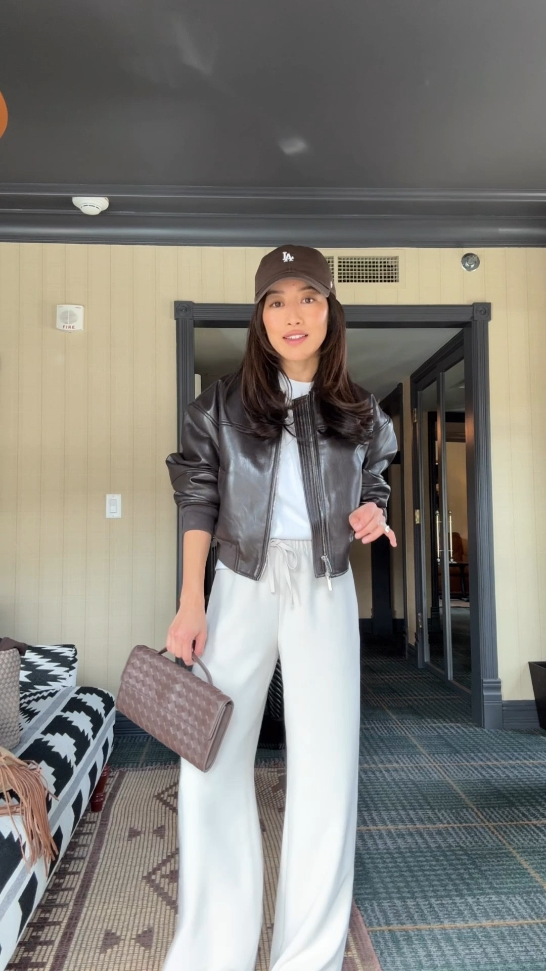 Sizing info below and linked a similar jacket for less

• Lodge pants 2XS short - runs long for petite. If you’re very short you are better off getting any length and hemming them. pull on elastic waist, wrinkle resistant, and beautiful drape.

• Aritzia faux leather jacket 2XS got this over a year ago with no issues. this is a more structured, edgier cut jacket that I always feel chic in and love for school drop off, running errands

• Madewell boxy oversized tee xxs bigger fit shorter length

• Sam Edelman slingback kitten heels 5.5 size up if between sizes since toe can be a little narrow 

• Quince handwoven top handle clutch 

• 47 brands hat from Anthropologie 

#LTKootd #LTKPetite #LTKTravel