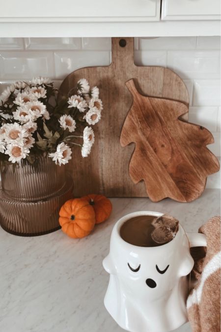 Fall kitchen counter decor, leaf cutting board, leaf snack board, bread board, ghost mug, cozy fall decor

#LTKSeasonal #LTKhome #LTKHalloween