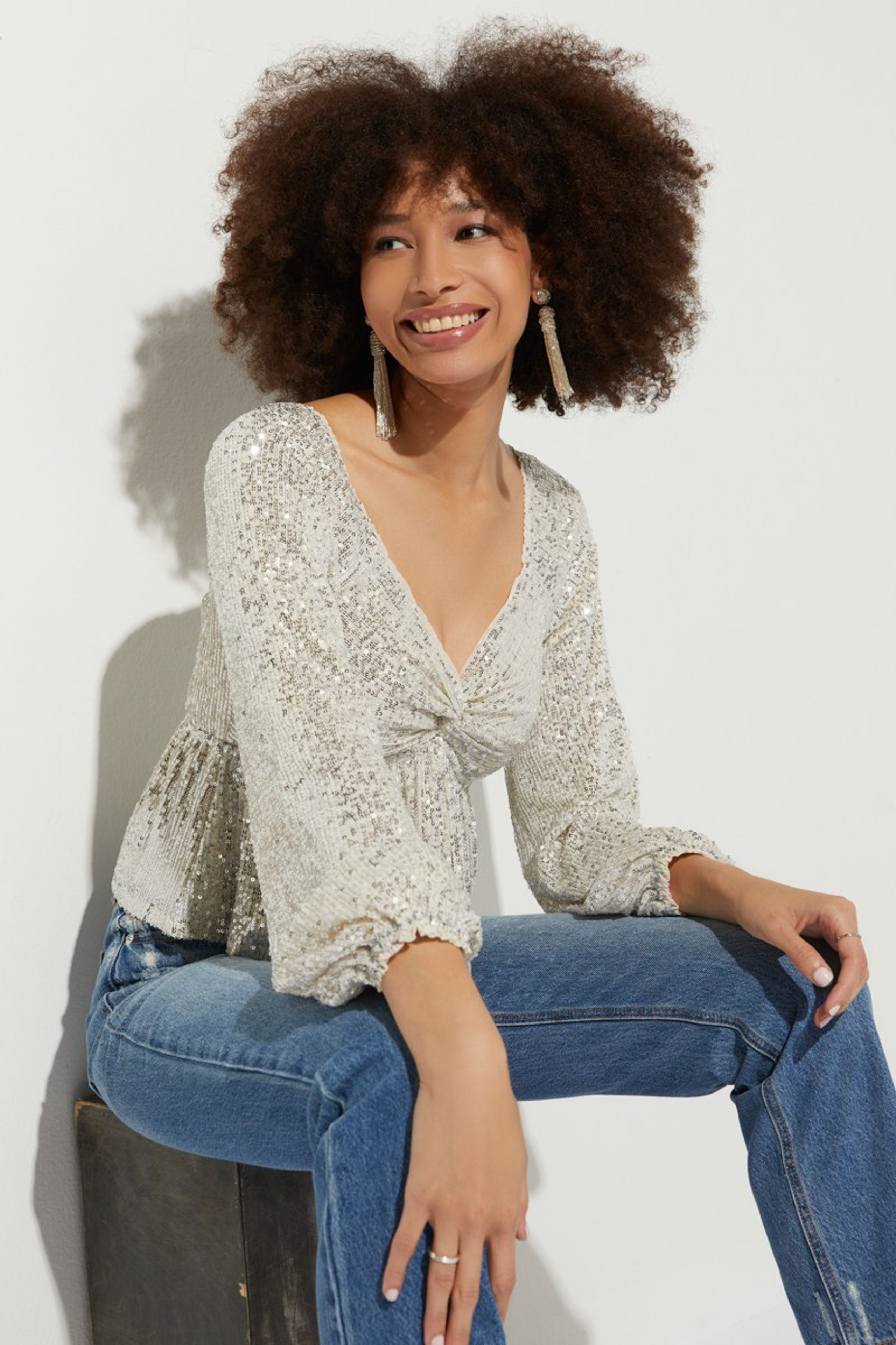Nicolette Sequin Front Twist Blouse | Francesca's