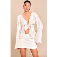 Cream Sheer Plisse Tie Front Flute Sleeve Blouse | PrettyLittleThing US