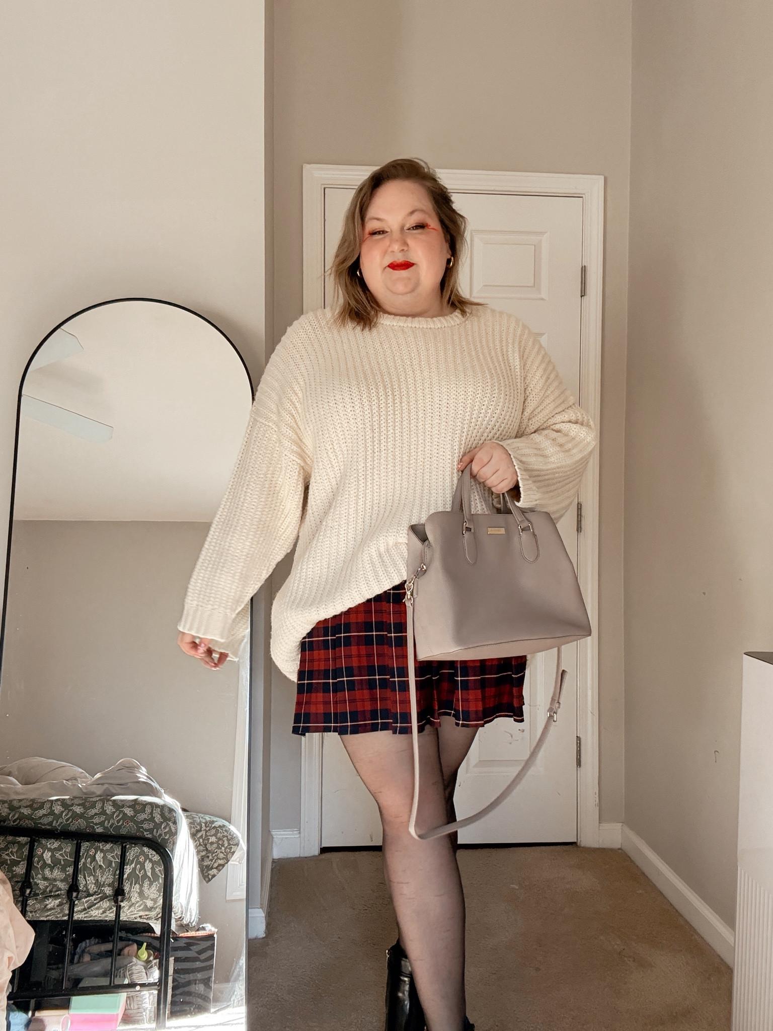 Finding the perfect plus-size holiday outfit? Done 🎄✨ This pleated mini skort is cute, festive, and can be styled a million different ways! 

#LTKSeasonal #LTKPlusSize #LTKHoliday