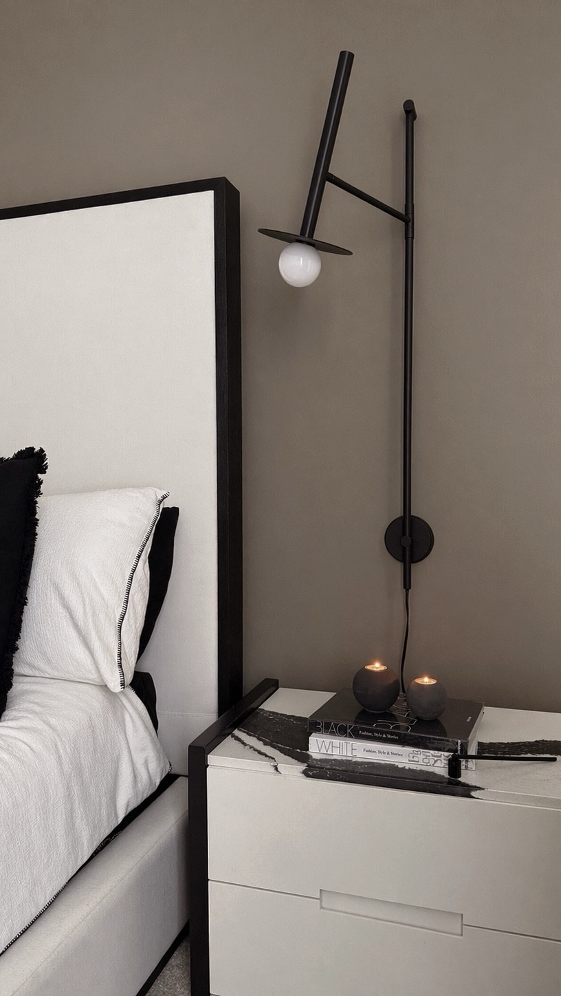 Simple bedside styling made better 🤍 I love wall sconces for freeing up nightstand space and keeping the look clean and intentional. These concrete candle holders are the perfect finishing touch for a soft, modern glow.

#ltkhome #ltkstyletip #bedroomdecor #nightstandstyling #bedsidestyling #minimalisthome #modernhome 
 #wallsconce #homedecor #neutralhome #nighstand

#LTKHome