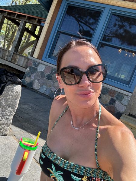 First official bikini day here Minnesota! Love that the top is adjustable and can also be worn as a strapless bandeau. Paired with my favorite Prada glasses and of course my neon Stanley! 

#LTKOver40 #LTKSwim #LTKHome