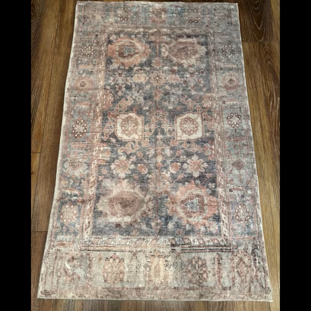 It’s not easy to find a rug with gray in it that doesn’t fall flat. This rug has beautiful shades of terracotta mixed with charcoal gray in a muted traditional pattern. It feels like velvet under your feet and is easy care. 

#LTKHome