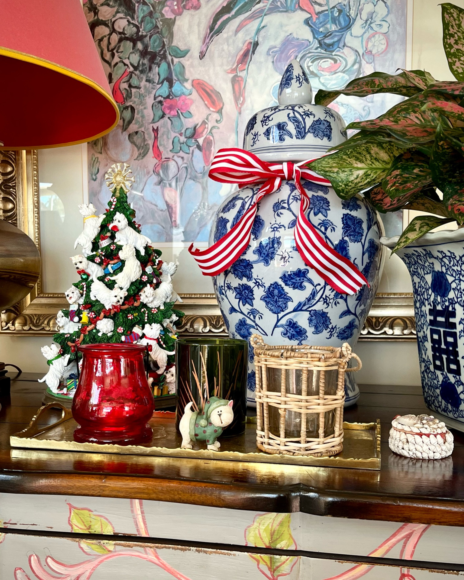 Just a little collected corner in the breakfast room.. Danbury Mint Westie Christmas tree. Blue and white ginger jar tied with a holiday ribbon. I keep a stock of
Blue and white cachepot flower pots for any plants I bring home. Couldn’t find the tiny Westie but did spot a cute little guy..

#LTKSeasonal #LTKHoliday #LTKGiftGuide