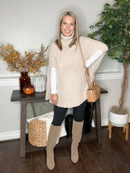 The cutest poncho sweater from Amazon that’s so easy to style!! I’m wearing a size medium poncho and size small leggings at 34 months pregnant! 

Fall outfits, boots, thanksgiving outfit, Amazon style 

#LTKbump #LTKstyletip #LTKSeasonal