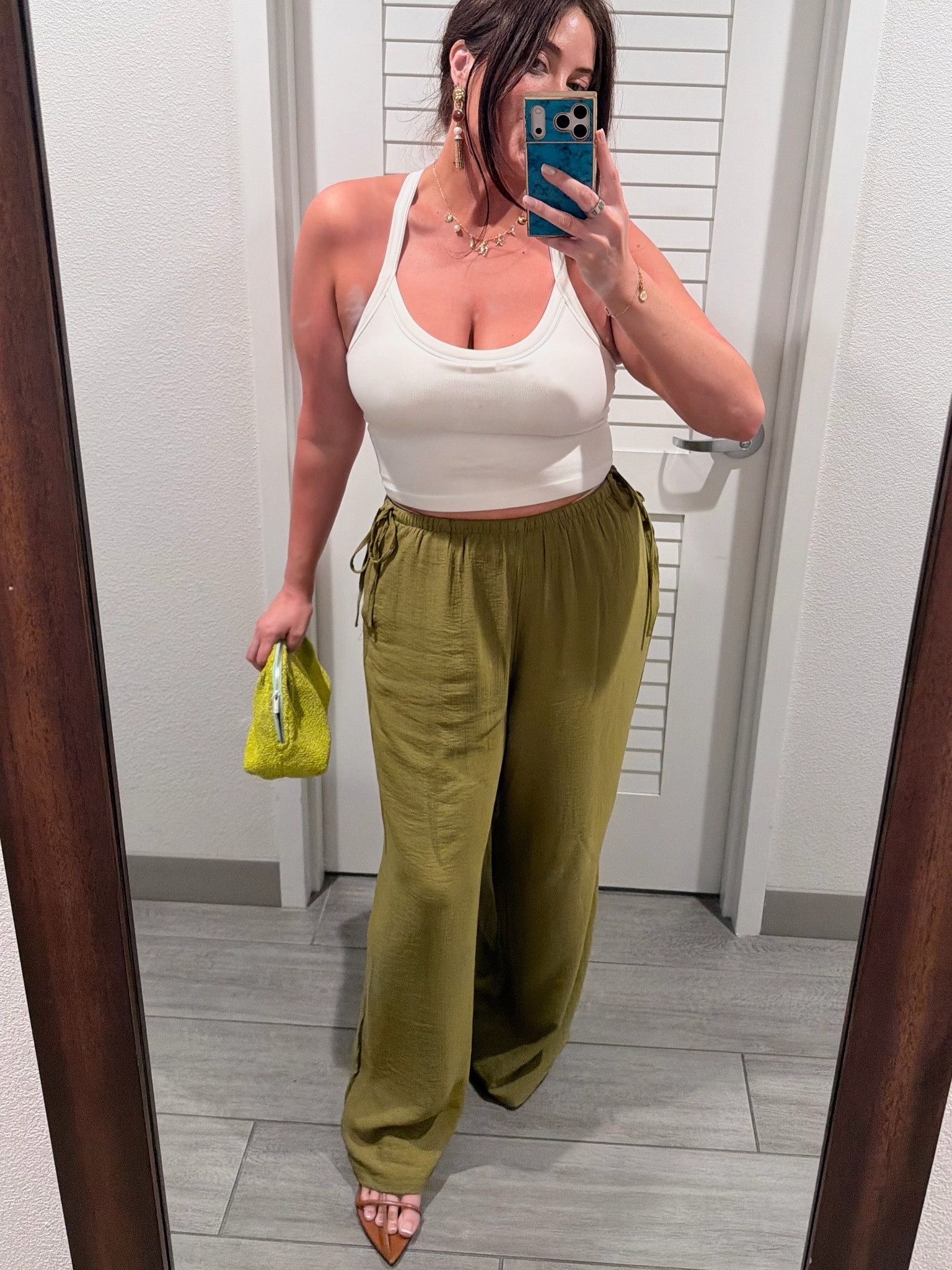 Earrings are Mister B.! I am in XL top and bottom. Pants run a bit long and are a bit large. Top isn’t super cropped unless you’re all torso like me!
