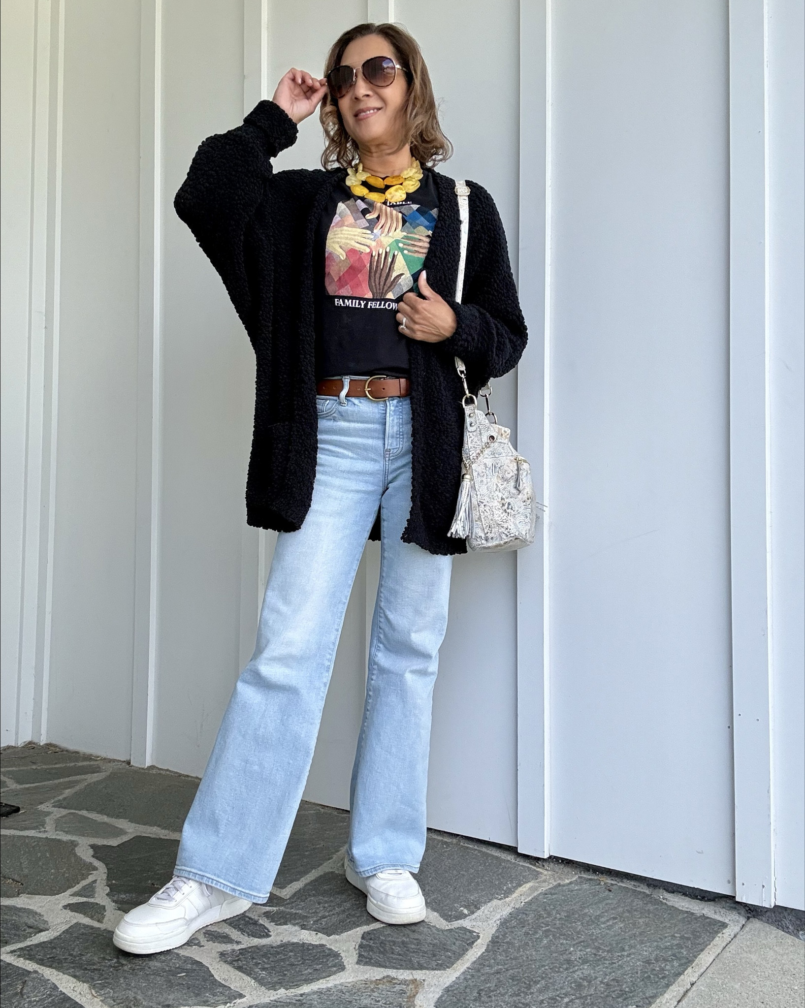 Sharing one of my favorite outfits spring 2026! When you’re running errands, nothing beats a graphic T, light wash flares, and your favorite pair of trainers. Bring some confident energy to the look with a statement necklace. 
I’m so glad you’re here girlfriend. Scroll to shop, and follow for more affordable style.

#LTKSeasonal #LTKmomlife #LTKOver40