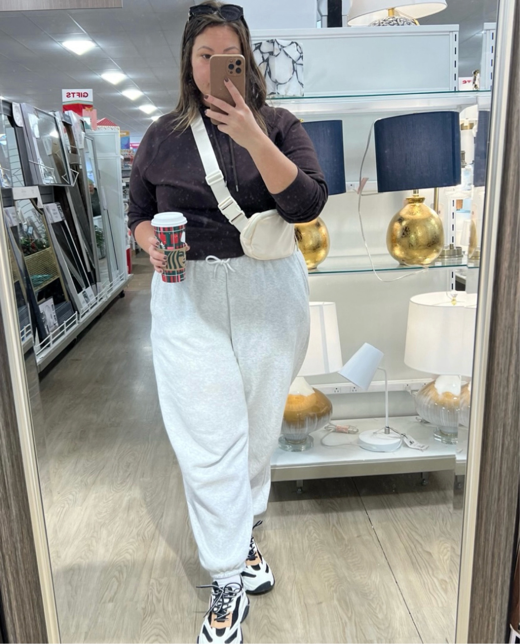 Comfy fit running errands & home goods run! Loving this cross body! It is my go to. It fits basically all you need, you can style it so many ways and looks great. These high waisted sweatpants are super comfy too! I’m 5’7 and they are the perfect length 🙂

Sometimes it’s hard to find a hoodie with long enough arms and this one fits perfect. I love the crop with the high waisted sweats! 

Hope this helps you 🥰

#LTKmidsize #LTKstyletip #LTKplussize