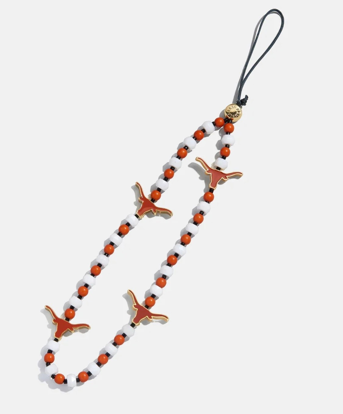 OBSESSED with this new Longhorn phone charm wristlet from @baublebar!! All of their new items for the season are AMAZING!!! Hook ‘Em!! 🤘🧡 #texaslonghorns #texasgameday #burntorange #ut #gamedayfashion 
#longhornfinds #utlonghorns #utorange #texasfight #utaustin #longhorn #bevo #texasexes #longhornaccessories #longhornphonecharm