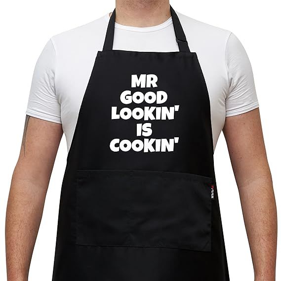 Savvy Designs Mr Good Lookin Is Cookin BBQ Apron, Funny Apron For Men - Adjustable Black Apron wi... | Amazon (US)