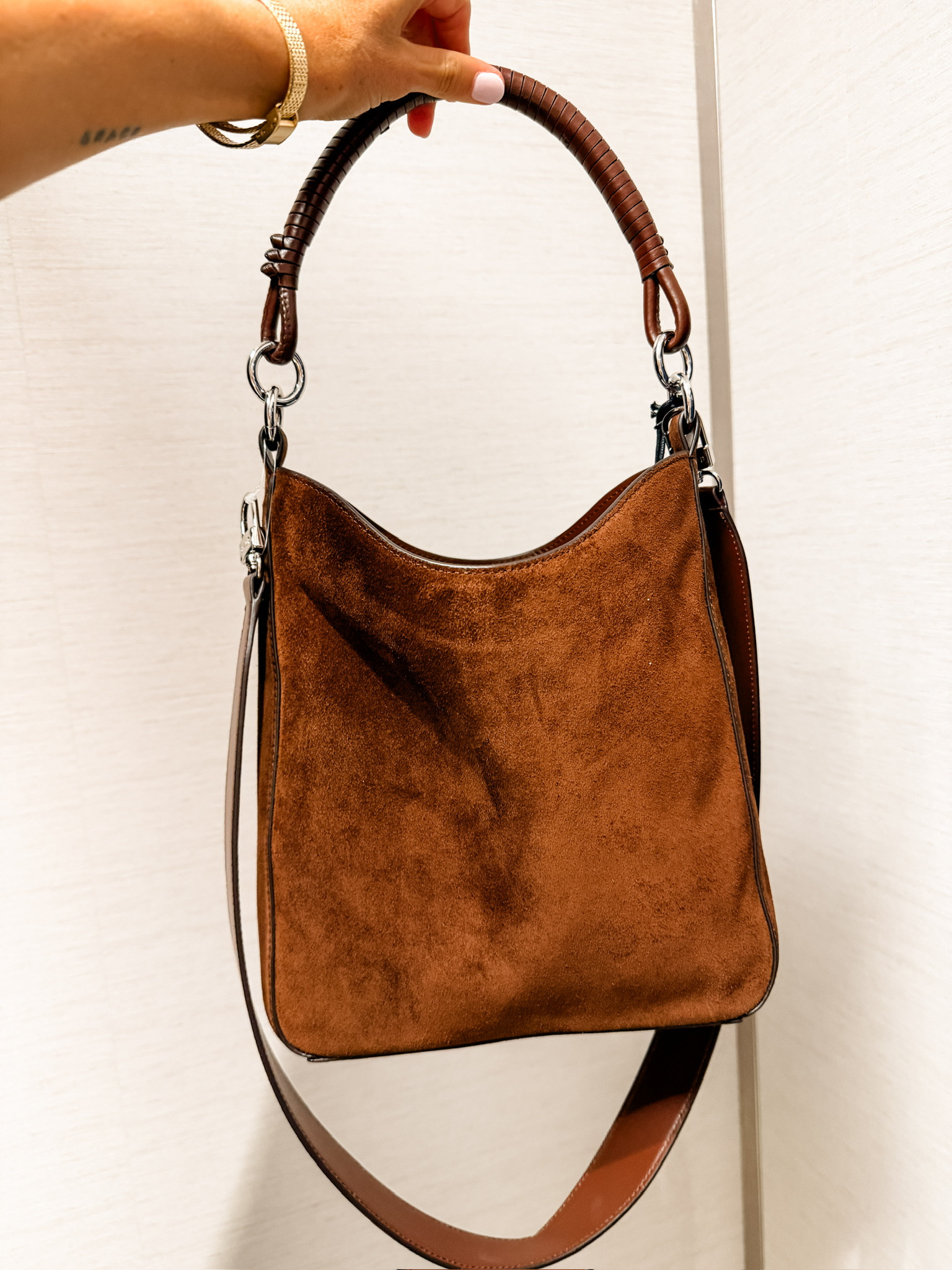 Love the shape of this designer bag! It comes in two shades of brown, and it's part of the Nordstrom anniversary sale!

Loverly Grey, staud, nordstrom anniversary sale, NSale, faux suede purse, fall purse 

 #LTKSeasonal #LTKSaleAlert