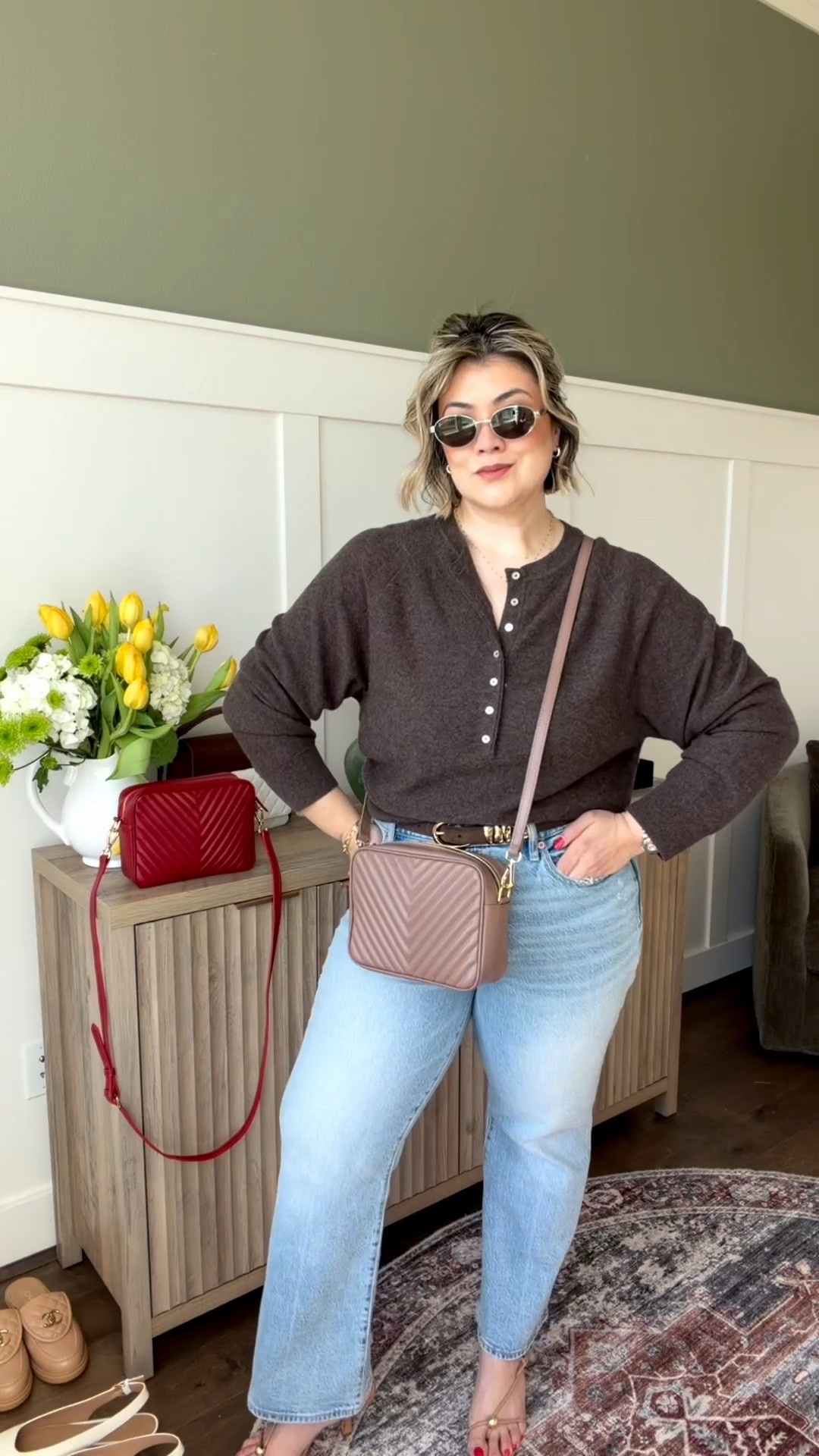 I’m wearing this cashmere sweater in a size large though I did just buy the blue in a size medium. I’ve lost a little bit of weight and the large fits slightly on the bigger side so I decided to try one size down if you are thinking about giving these jeans a try my recommendation would be to size up one if you are similarly shaped as me with thicker thighs, hips, and booty. The wash I am wearing is in high tide. Also, I cannot say enough good things about this Crossbody leather handbag. As you can see I have the exact same one in red in the background. I loved it so much I decided to grab the beige.

#LTKSaleAlert #LTKgrwm #LTKMidsize