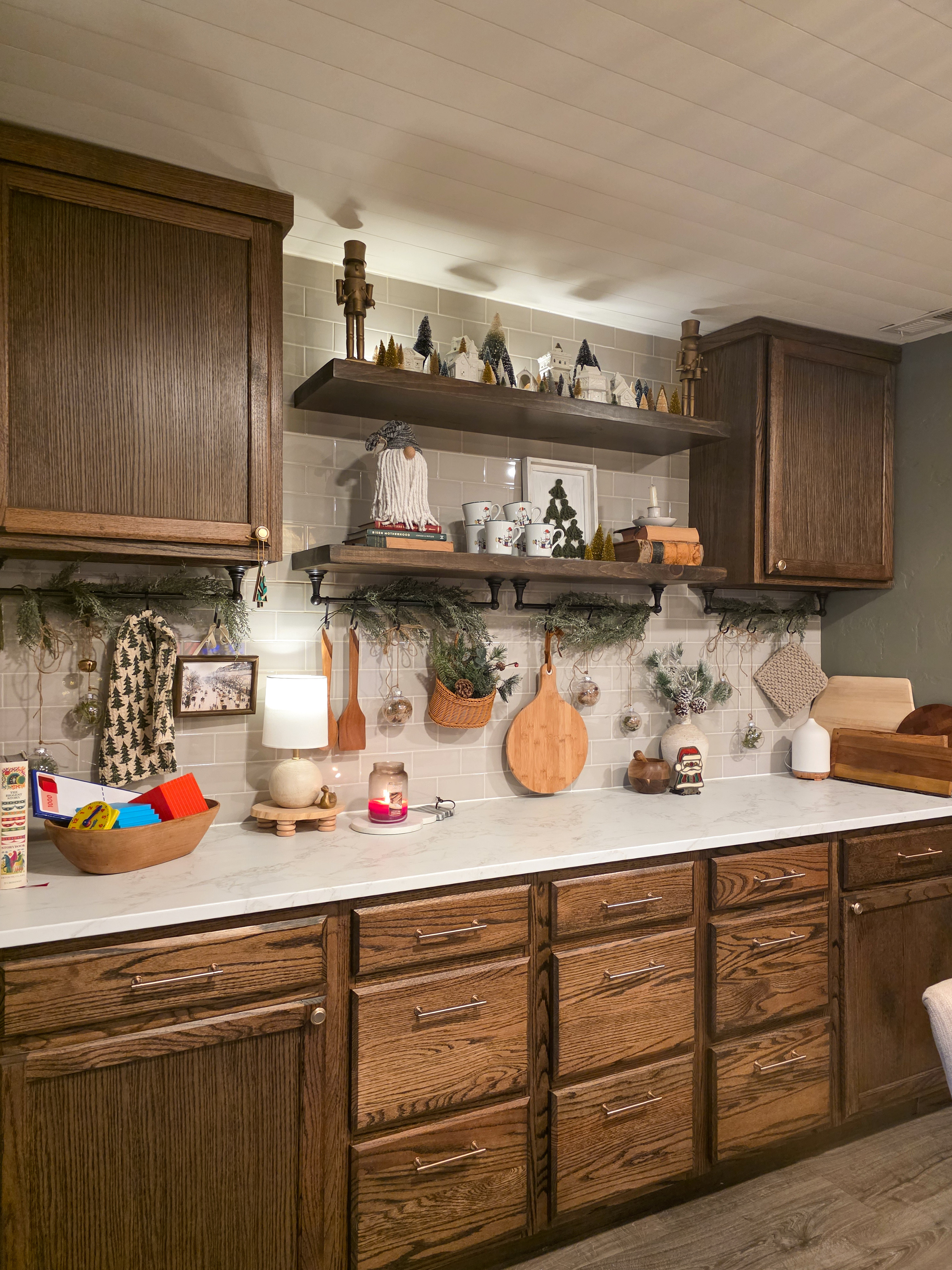 This wall of built-ins in our dining room looks so magical when it is all decorated for the holidays! #diningroom 

 #LTKHoliday #LTKSeasonal #LTKHome