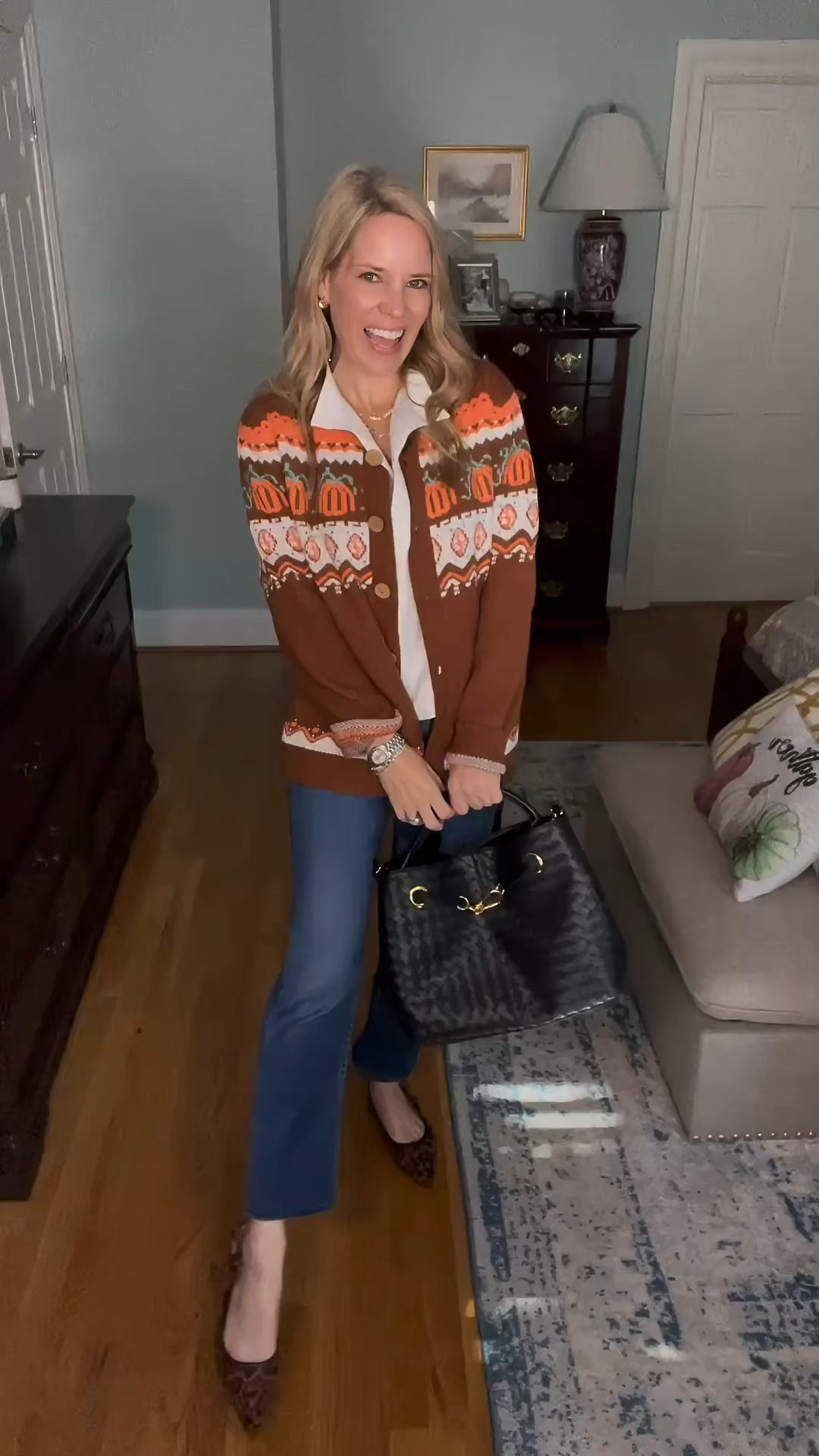 🍂✨ Fall fashion favorite! This cozy pumpkin print cardigan is the ultimate festive layer for autumn 🍁🎃. I styled it with a crisp white button-down top and my go-to high-waisted jeans, making it the perfect casual-chic outfit for pumpkin patches, school events, or weekend outings. The plaid padded headband adds a preppy touch, while my classic gold jewelry stack (necklace + hoops + bracelet) elevates the look with timeless shine ✨.

Paired with a structured satchel bag and leopard slingback flats, this outfit blends cozy comfort with a polished finish—ideal for everyday wear this season. 🍂

🛍 Shop the full look:
	•	Fall pumpkin cardigan (Amazon)
	•	White button-down top (Amazon)
	•	Mother Denim jeans
	•	Plaid padded headband (Amazon set)
	•	Hazel satchel bag (Walmart)
	•	Leopard slingback flats (Target)
	•	Abbott Lyon watch
	•	Melinda Maria necklace, hoops, and bracelet stack (use code PREPPYREBEL for 10% off ✨)

🎃🍁 Cozy, chic, and festive—this fall outfit has it all!

⸻

 fall cardigan outfit, pumpkin print sweater, cozy fall fashion, affordable Amazon fall finds, plaid headband, leopard flats outfit, casual chic fall style, pumpkin patch outfit, fall jewelry stack


#LTKFindsUnder50 #LTKFindsUnder100 #LTKOver40

#LTKFindsUnder100 #LTKFindsUnder50 #LTKSeasonal

#LTKFindsUnder50 #LTKItBag #LTKShoeCrush