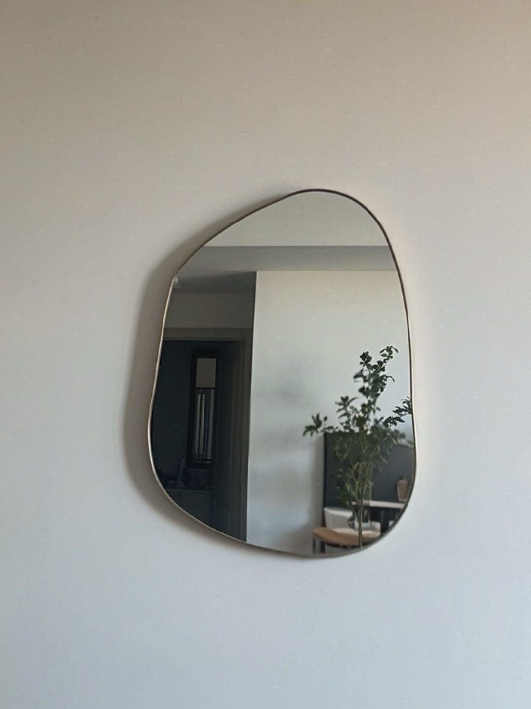 One of my more popular posts this year, asymmetrical mirror that adds interest + depth to a small room, space or apartment. Looks great in foyers, halls, dorm rooms or a smaller wall in the bedroom or living area. Easy way to update a wall or room decor.

#LTKFindsUnder100 #LTKSaleAlert #LTKHome