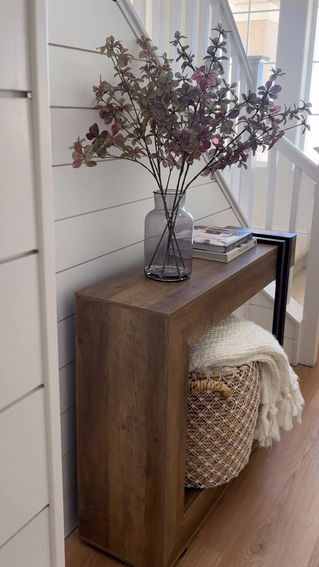 Our foyer was missing something and this console table was exactly it ✨ love the wood finish and metal accents! I added decor on the top shelf while using the bottom for a storage basket 🫶🏻

#LTKHome #LTKSaleAlert