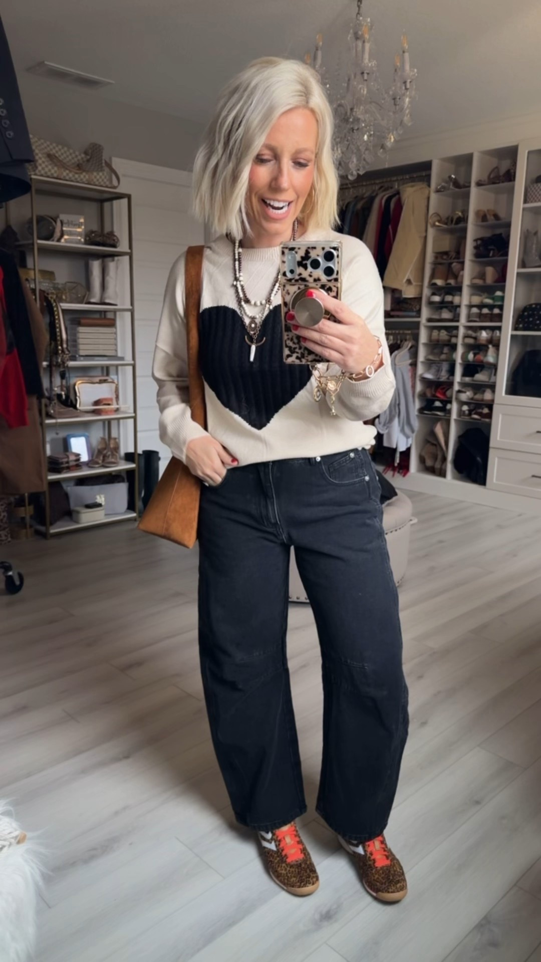 I’m loving this heart sweater that’s comes in so many good colors!!! 
⬇️⬇️⬇️
Sweater size medium (could have done small)
Jeans medium (roomy fit)
Shoes TTS

#LTKSeasonal #LTKSaleAlert #LTKFindsUnder50