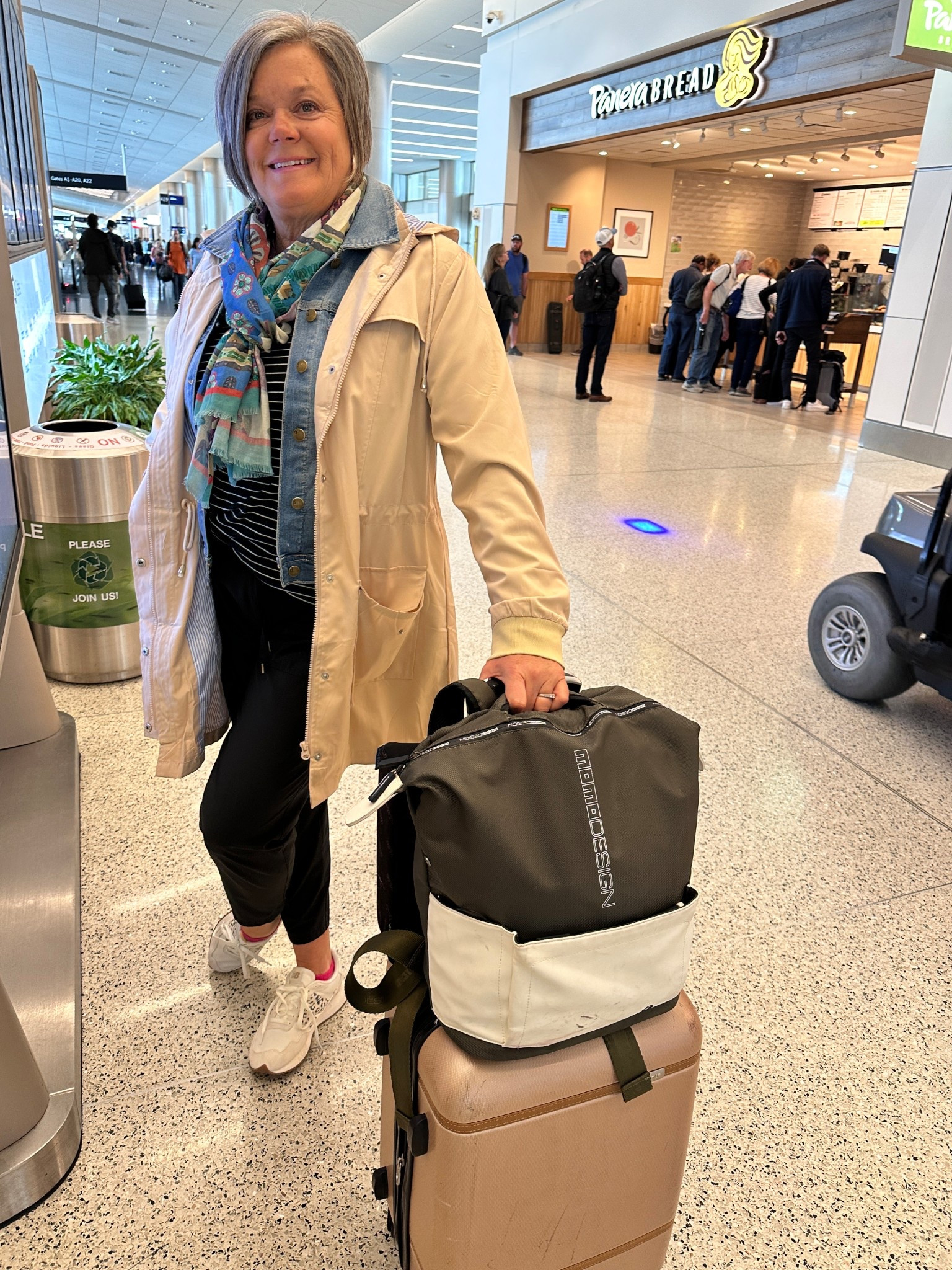 Travel for 15 days with only carryon luggage. My two tone backpack is from Italy but I found one similar. 
My travel outfit- wear your denim jacket and raincoat to leave room in luggage. Loving this lightweight raincoat that is lined. 
White sneakers with leopard detail and super comfy and go with everything! 
@coldwater scarf in a beautiful watercolor print is perfect to dress up or down an outfit. #midsizeover50 #classicfashion #styleatanyage #raincoat 

#LTKMidsize #LTKOver40 #LTKTravel