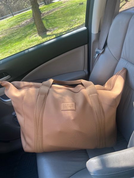 The best weekender bag ever !!  It fits everything I need in this rich camel color with tons of pockets 