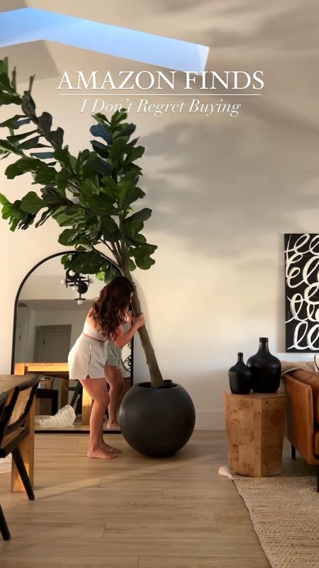 Amazon finds! This is the 10’ faux fiddle leaf and the price has gone down!!! It was over $500 when I bought it. #meandmrjones 

#LTKhome #LTKsalealert #LTKVideo