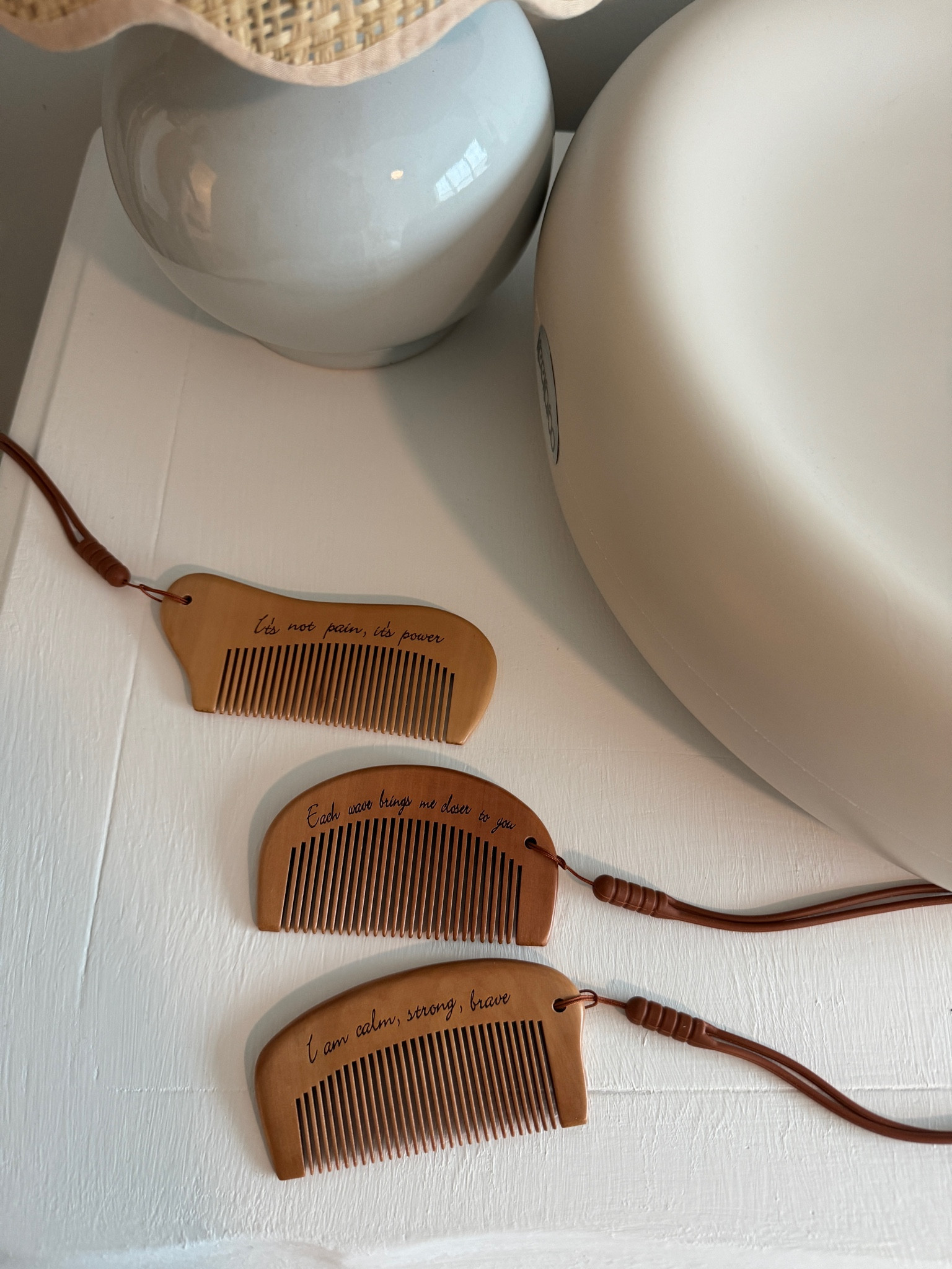 Combs for labor that helped. Cute sayings on them. You squeeze them through contractions  

#LTKBump #LTKBaby