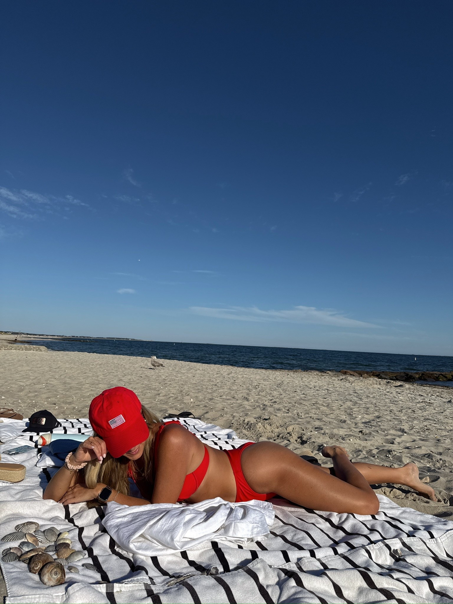 Red bikini beach day 🌊 

Memorial Day weekend, 4th of July style, American fashion, coastal summer style, New England aesthetic, preppy summer style, nautical fashion, classic American style, summer outfit, holiday weekend look, East Coast style, summer capsule wardrobe

#LTKootd #LTKTravel #LTKSwim