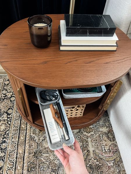 We swapped our nightstands with drawers for these cabinet style end tables with sliding doors and love them! My husband can keep his cpap supplies on his side and I have room for my leg pillow and eye massaging mask, plus a big stack of books. 

#LTKhome