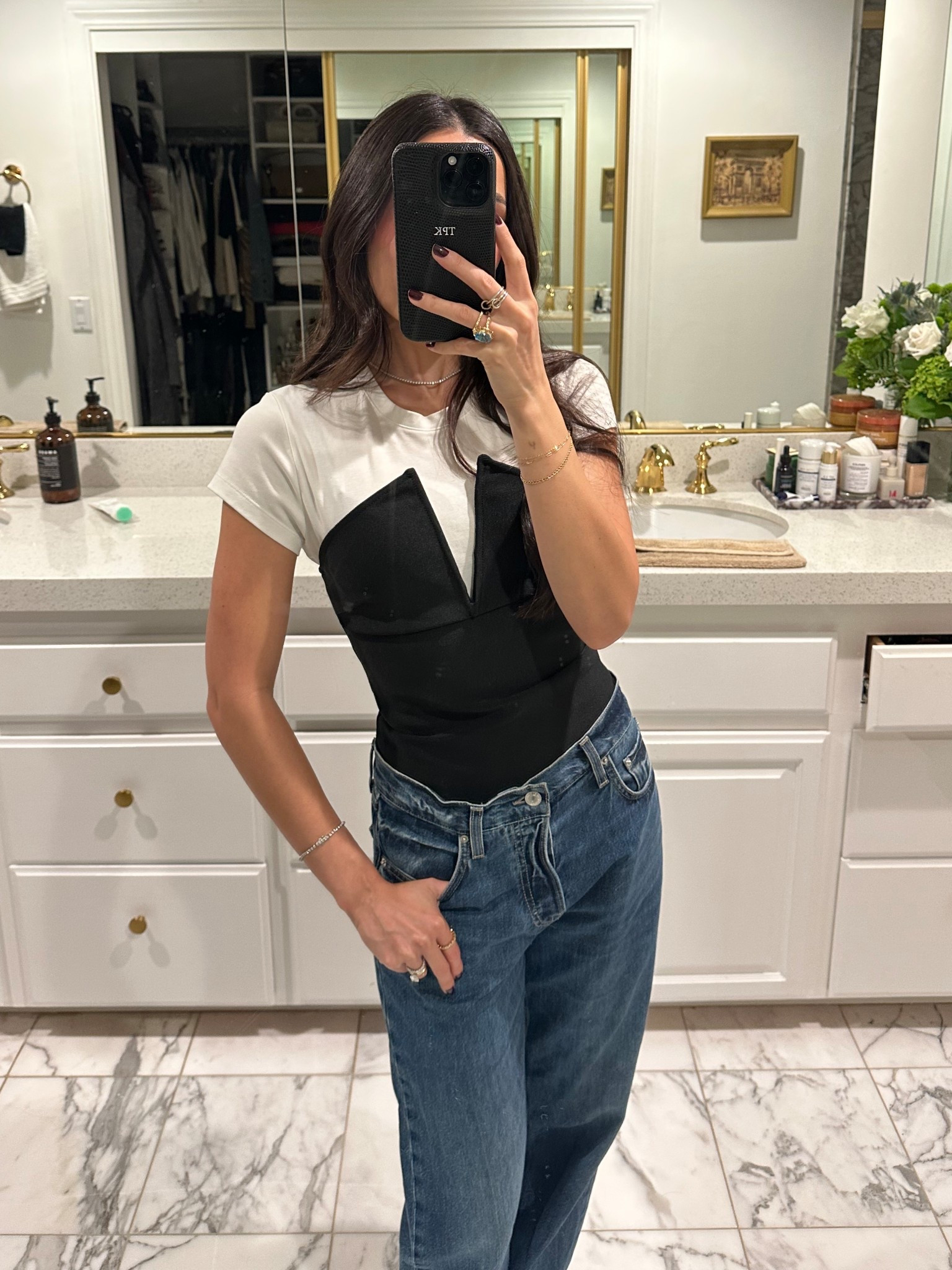 Layered this old strapless top over my favorite baby tee for a comfy but elevated NYE look

#LTKFindsUnder100 #LTKFindsUnder50