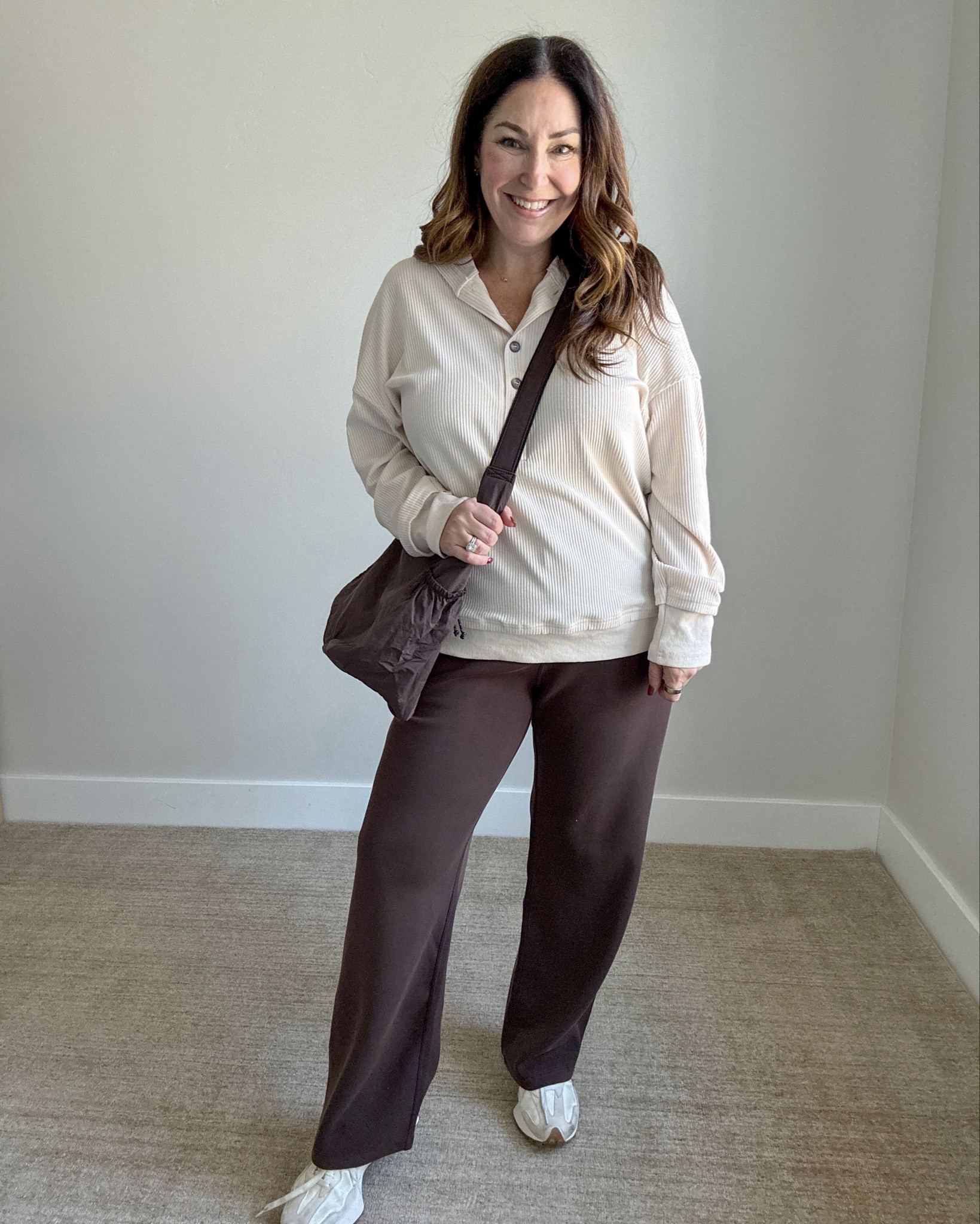 Stay cozy and stylish with this comfy hoodie and wide leg sweats. Wearing large in sweatshirt and XL in pants #sweaterweather #newbalance #crzyoga 

 #LTKSeasonal #LTKMidsize #LTKFindsUnder50