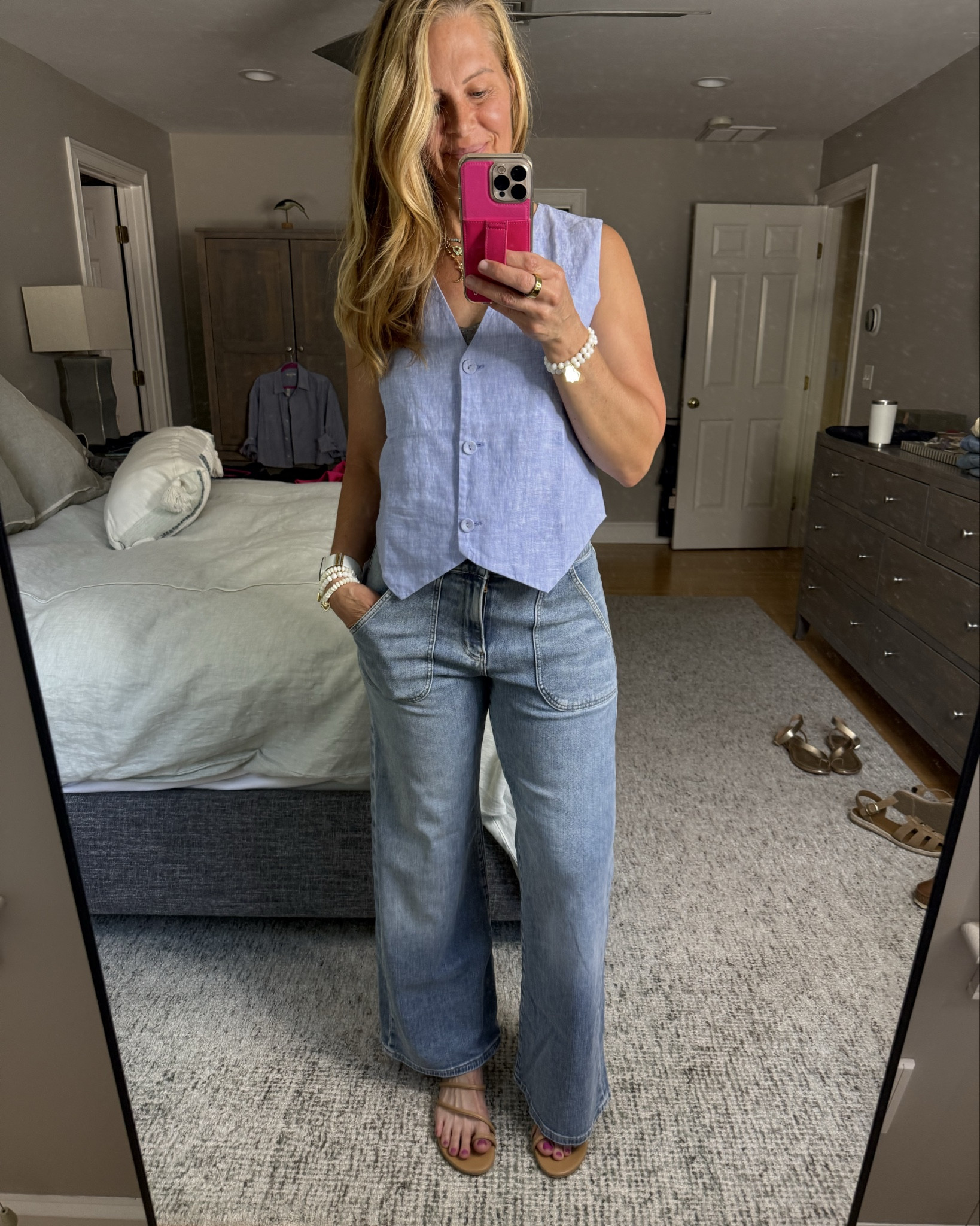 Add a splash of color to any outfit with the super cute quince linen button up vest. I paired it with my frame Carpenter jeans all items run true to size however, the Quince vest I did size down to a size small where typically I am a medium.  

#LTKStyleTip #LTKOver40 #LTKSeasonal