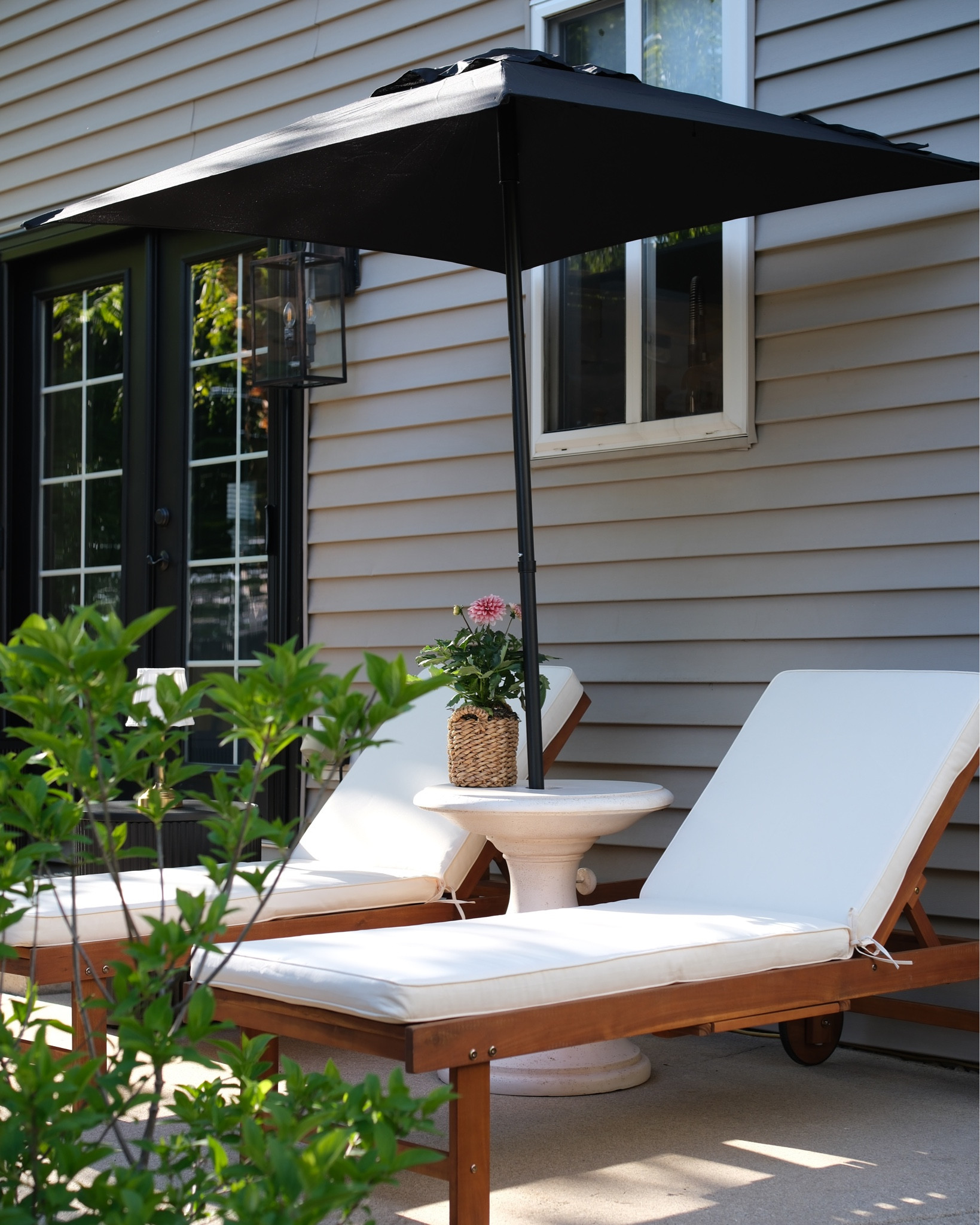 Patio loungers with wheels and comes with cushion and slide out side table 

#LTKHome #LTKSeasonal