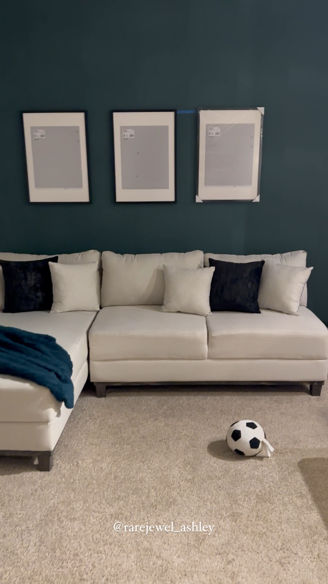 My living room family portrait wall is still coming along and I am loving it. 

I haven’t decided on photos to be printed yet, but I do plan on having them printed in black & white. 

And, I’m guessing my dog is loving the living room too, since he insisted on playing with his soccer ball. 
#livingroom #homedecor #familyportaitwall #familywall #photowall #trending 

#LTKhome #LTKfamily #LTKunder50