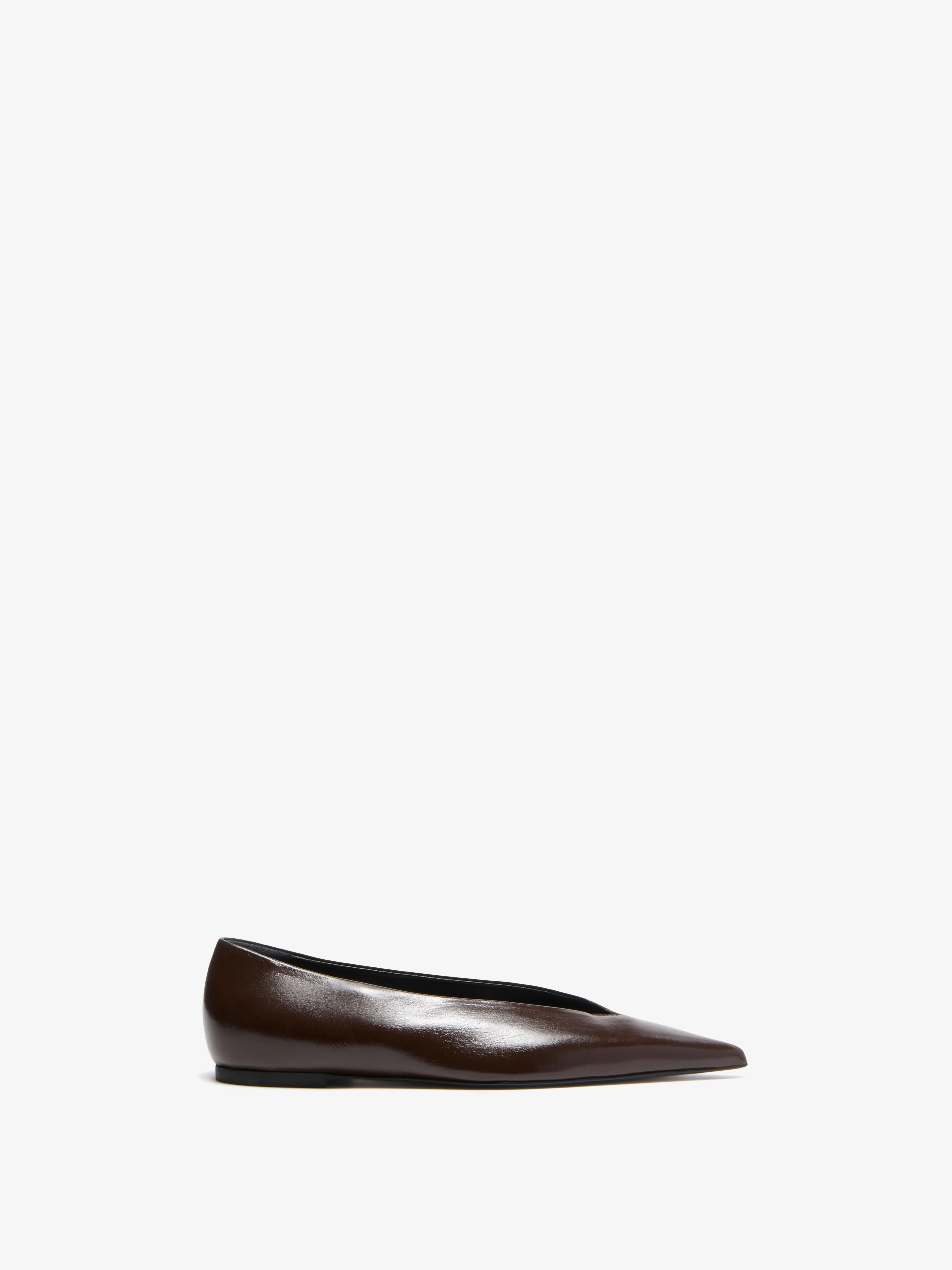 The Slash Flats are crafted in slick nappa with a flat-bed silhouette and an exaggerated deep V-c... | Proenza Schouler LLC