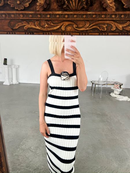 The cutest black and white striped dress. Would also be precious with a baby bump! 

#LTKfindsunder100 #LTKbump