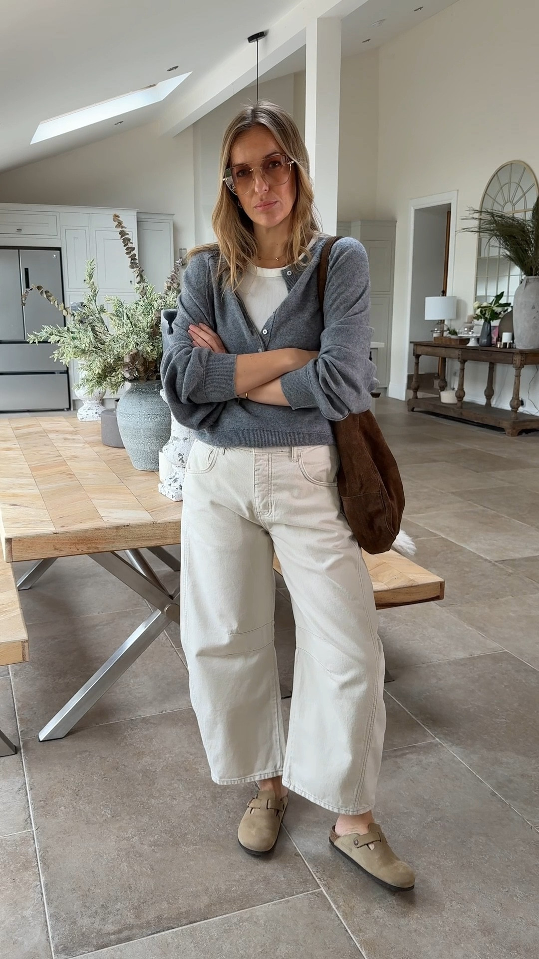 Free people barrel jeans  and slouchy cashmere. 
I absolutely love the silhouette of this jumper - great for effortless layering 
Wearing a medium - other shades available . 
The jeans are a more curved barrel shape , not for everyone but they are the brands best selling jeans for a reason! Wearing a 29 regular 

Vest top in a large 
Jacket in a medium - the free people jackets are 👌🏻👌🏻👌🏻 easy to layer again and a great relaxed yet interesting layer. 

Spring outfit 
Cashmere 
Barrel jeans style 
Suede bag #LTKspring 

#LTKsummer #LTKuk