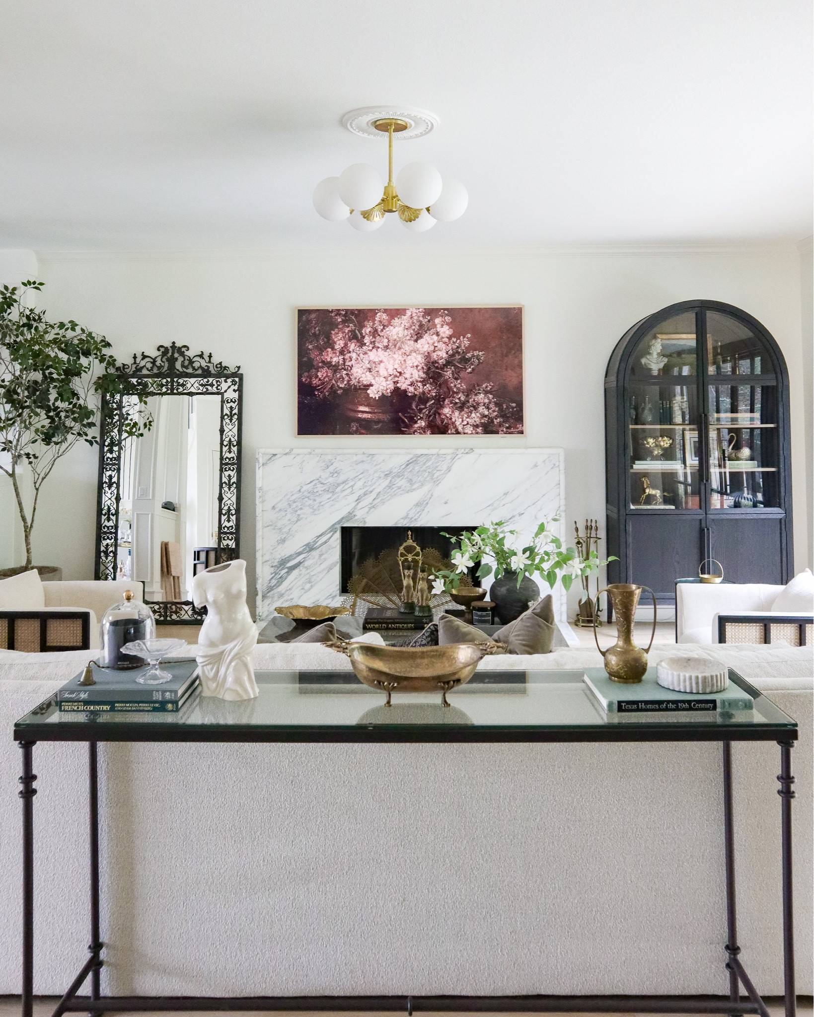 My living room Frame TV is the 75” with the beige bezel and vintage floral art from Etsy! 

#LTKstyletip #LTKhome #LTKsalealert