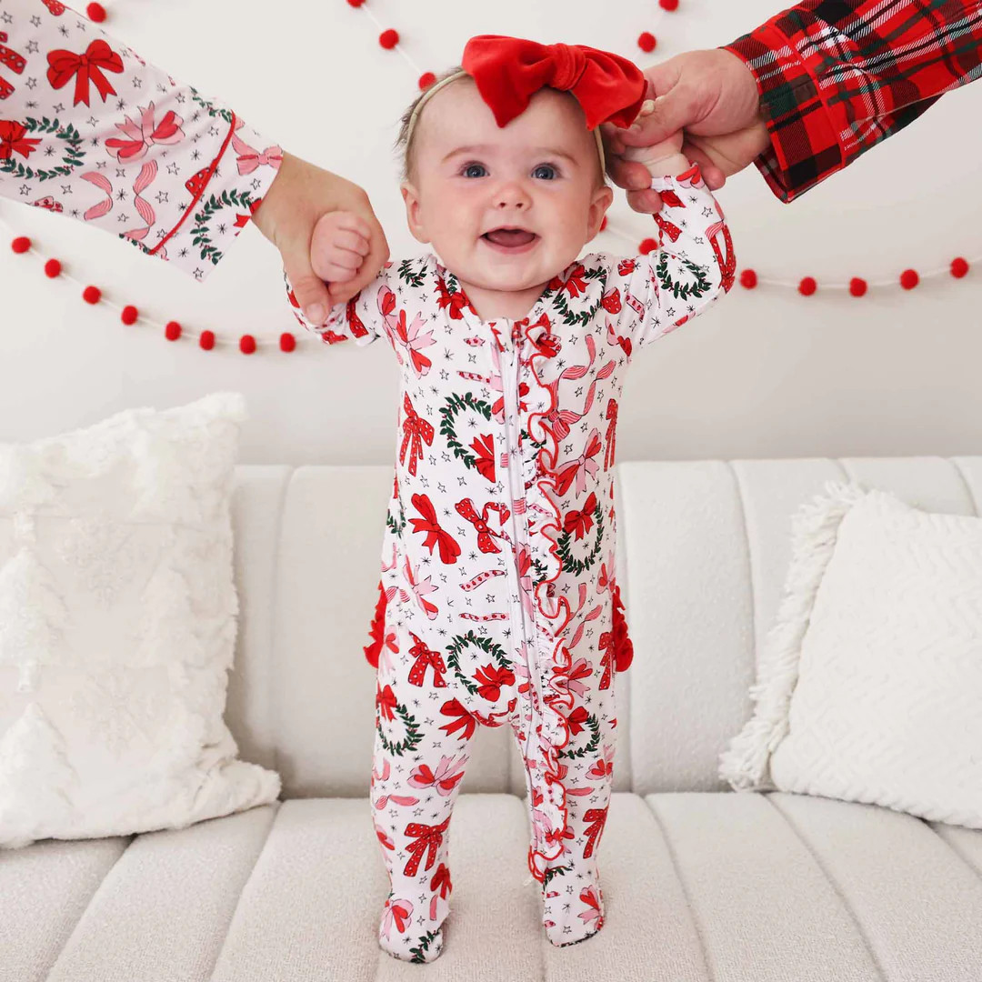 Wrapped In A Bow Ruffle Zipper Footie | Caden Lane