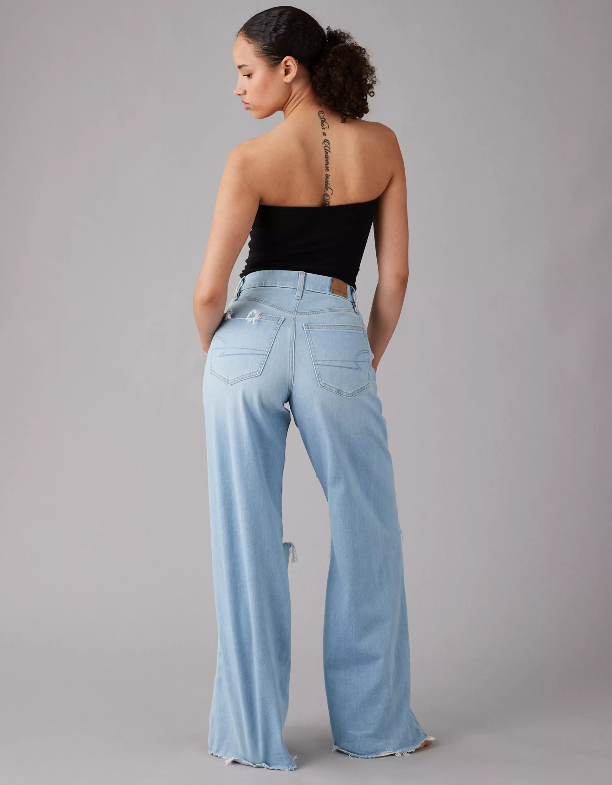 AE Dreamy Drape Stretch Curvy Super High-Waisted Ripped Baggy Wide-Leg Jean | American Eagle Outfitters (US & CA)