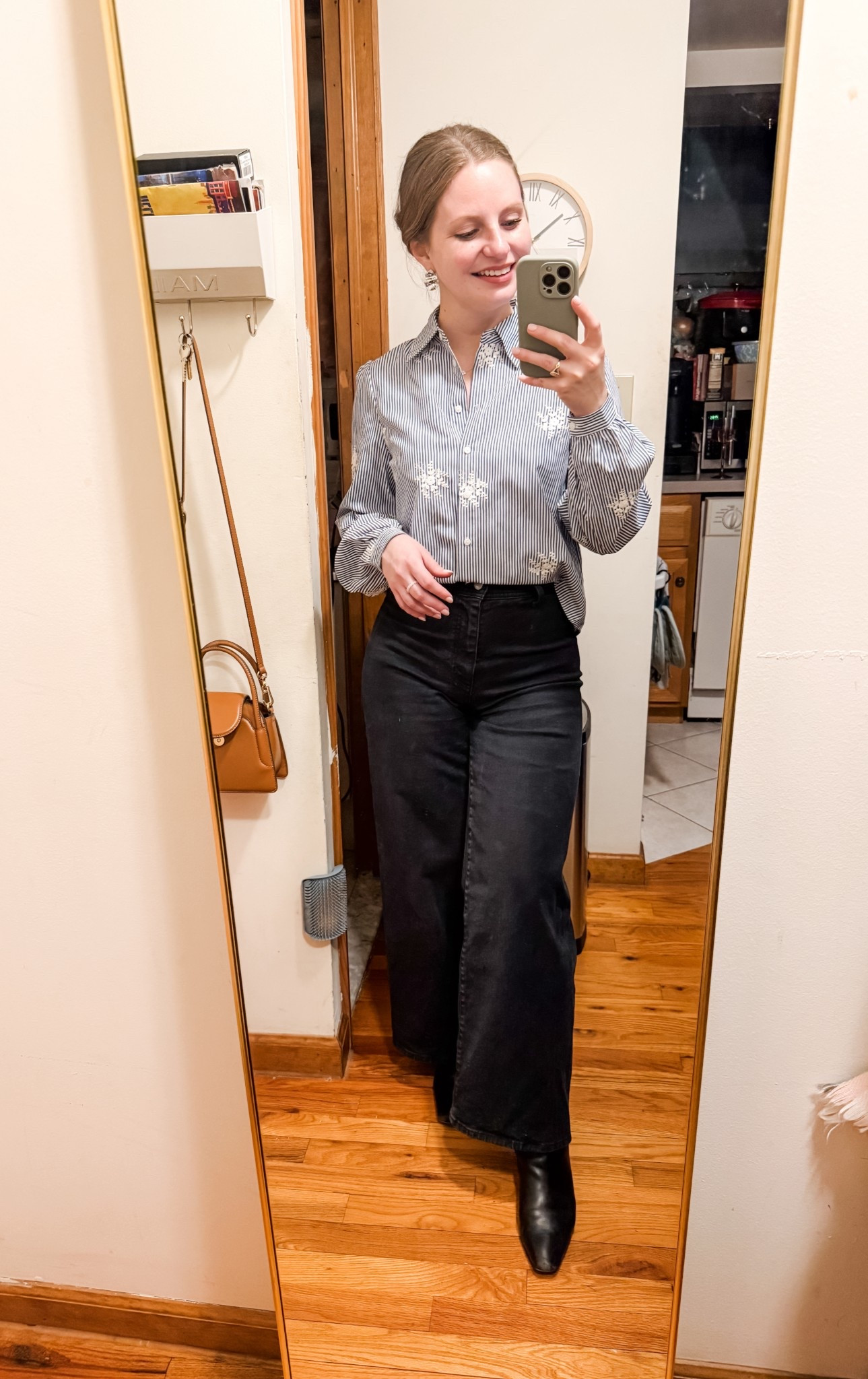 Casual work outfit in early spring. Embroidered striped shirt and black wide leg jeans. Similar pieces linked below!

#LTKspringtrends #LTKSpringSale #LTKWorkwear