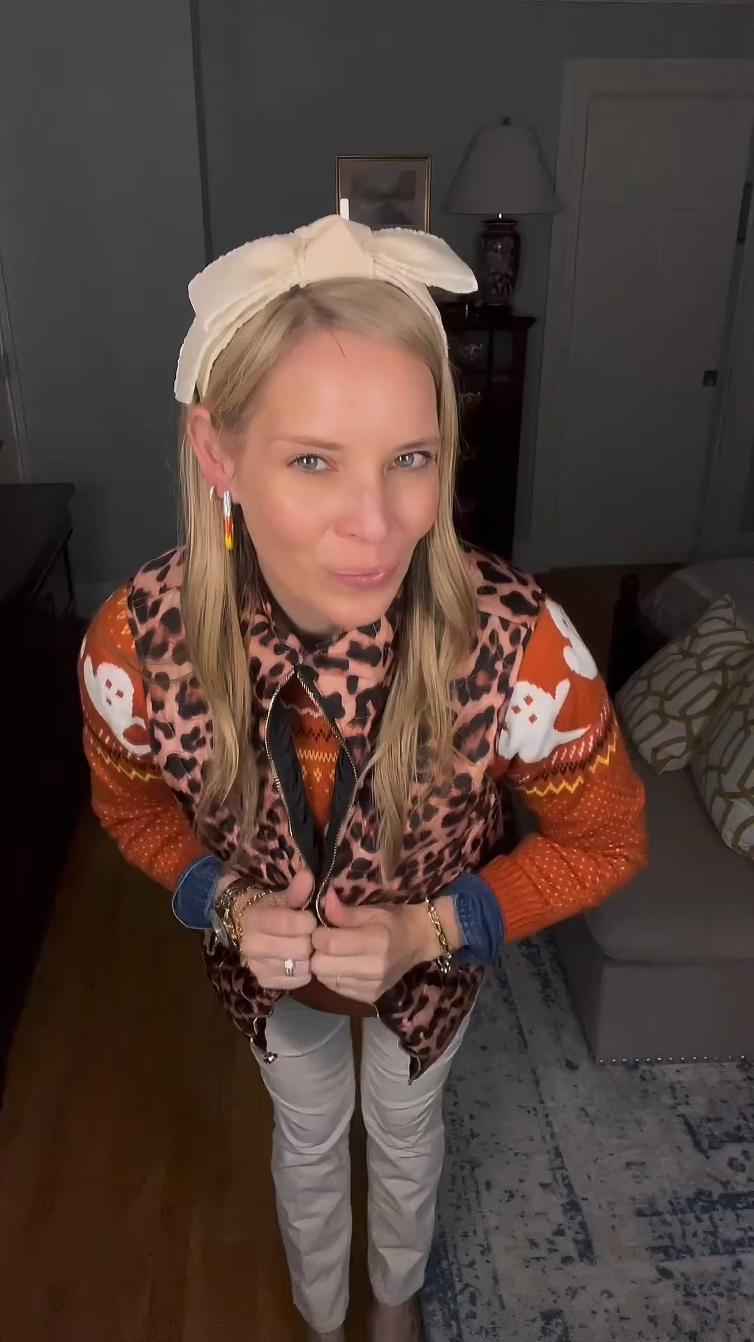 Fall layers but make them festive 🎃👻 I styled this cozy ghost print turtleneck sweater with a classic denim button-down shirt underneath for a preppy base, then added stretch corduroy leggings for comfort and warmth. The leopard quilted vest adds the perfect bold layer, while my ivory bow headband and candy corn earrings bring in those playful Halloween details. 🧡

Finished the look with a chic yellow crossbody bag + timeless accessories like my two-tone watch for a polished touch. This outfit works perfectly for pumpkin patches, school parties, or just cozy October days where you want to feel seasonal and stylish.

🛍️ Shop my full look below—Amazon, Talbots, Walmart, and BaubleBar finds all mixed together for a fun, affordable fall outfit!

✨ Keywords: Halloween sweater outfit, ghost print sweater, cozy fall layers, leopard vest outfit, corduroy leggings fall style, festive Halloween outfit for moms, candy corn earrings BaubleBar, affordable fall fashion finds, preppy layered fall outfit


#LTKFindsUnder50 #LTKFindsUnder100 #LTKItBag

#LTKFindsUnder100 #LTKFindsUnder50 #LTKOver40