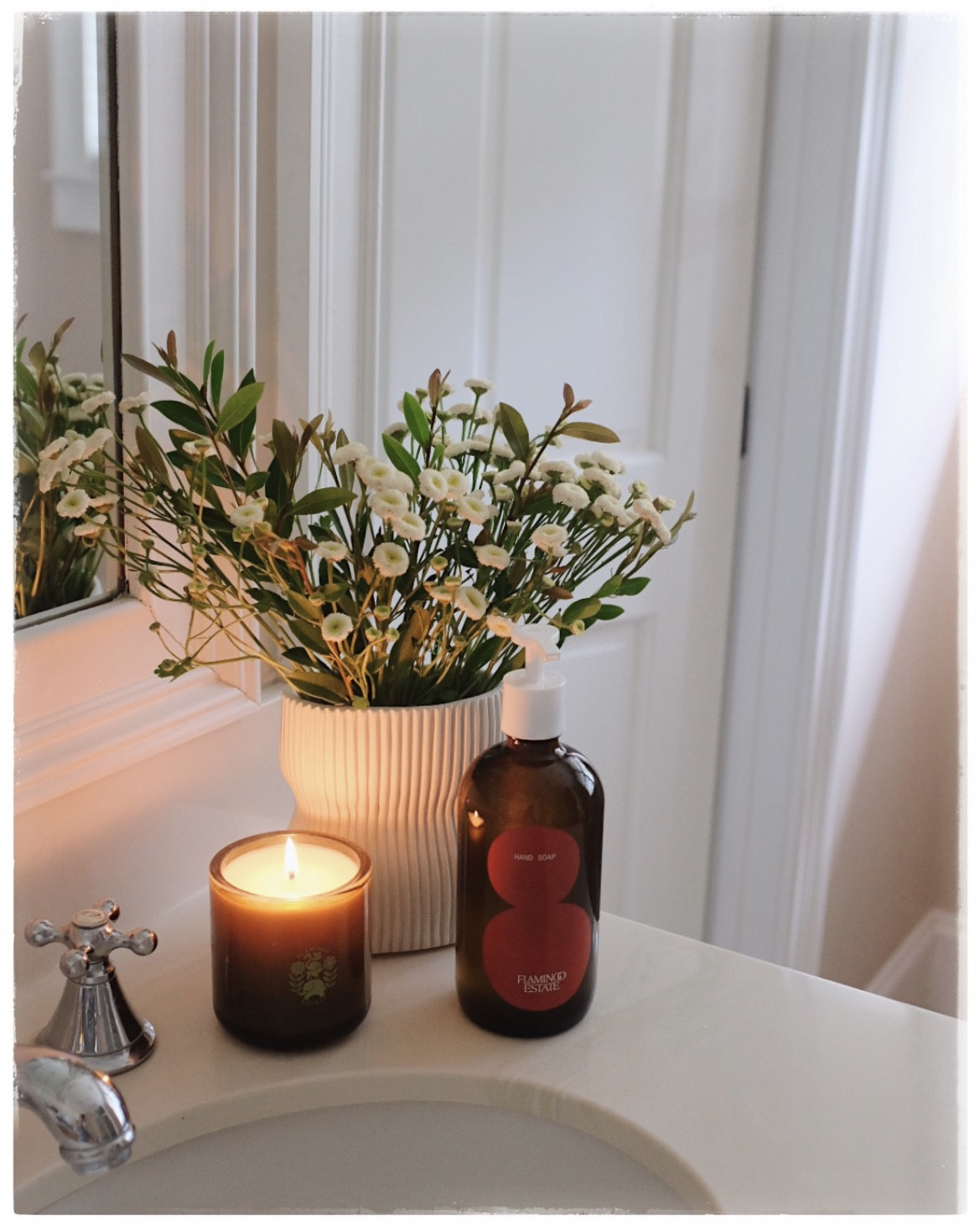 You all probably know by now that I've been a fangirl of @flamingo_estate for years  -- I swear by their olive oil, love their Estate Rosé, and their candles completely transform my home to my favorite smells! So when they sent me a collection of my favorite candles and hand soaps the other day, I felt COMPLETELY pampered. #ad #gifted

Their scents transport you to the dreamiest of gardens, and I always find their things to make for the perfect gifts. They sent over their Three Sisters Candle Set: each of the three scents are amazing and also complement each other so nice throughout the house! The 🍅 tomato candle 🍅 is their trademark (for good reason) but I think the rosemary might be my new fav?

The 🍅 hand soap is also such a nice touch for any bathroom or kitchen - there is nothing like elevating the mundane moments to feel like a treat, and washing your hands is one of those perfect moments to do so!

Linking to all of my current favorites from them for you here. Now excuse me while I go set the mood and light my candles! 

Happy Friday everyone —
xo.

#LTKHome