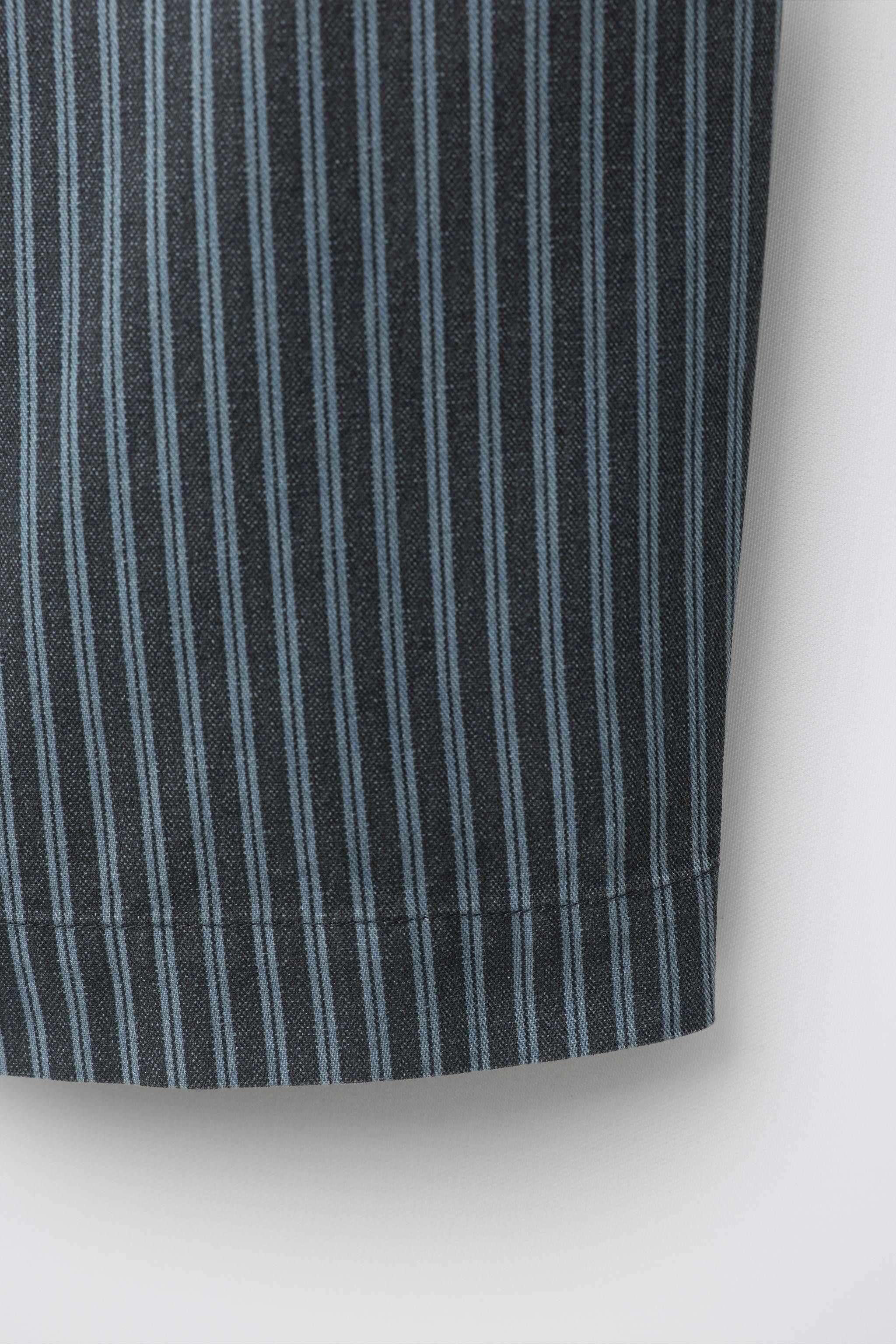 Baggy pants with adjustable waistband and front drawstring. Front pockets. Striped print. | Zara US