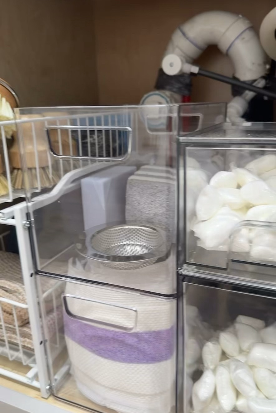 Under kitchen cabinet organization! These slide out storage bins make it so easy to organize sponges, dish clothes, dishwasher detergent and more!🧼🧽🫧

#LTKHome