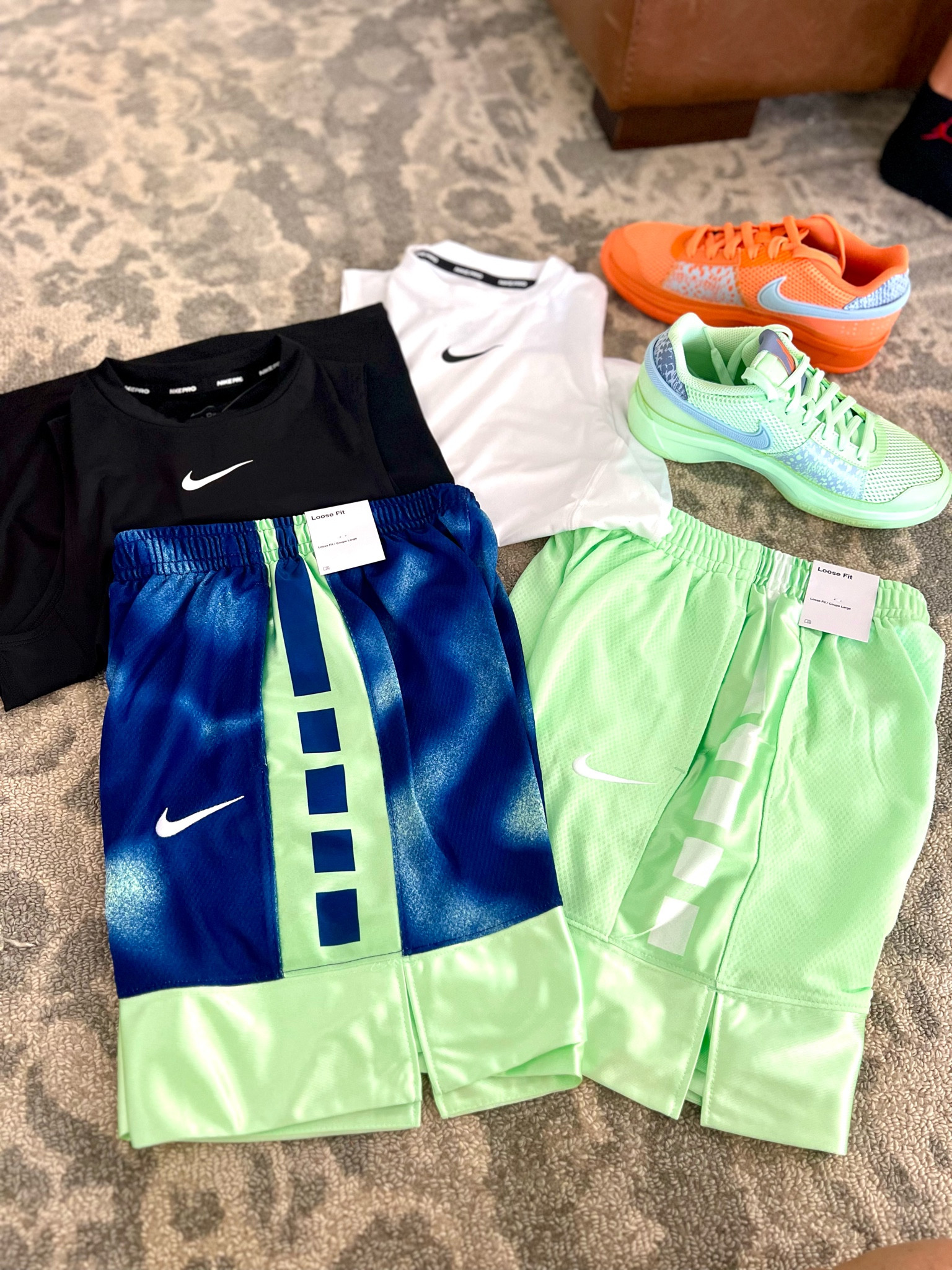 10 year old boys birthday- basketball lover edition 🏀 He wanted these mismatch Ja Morant shoes. He loves different & I’m here for it ;) 
Vapor green. Nike. Basketball clothes. Boys birthday. Kids clothing. Boys clothing  

#LTKshoecrush #LTKkids #LTKfamily