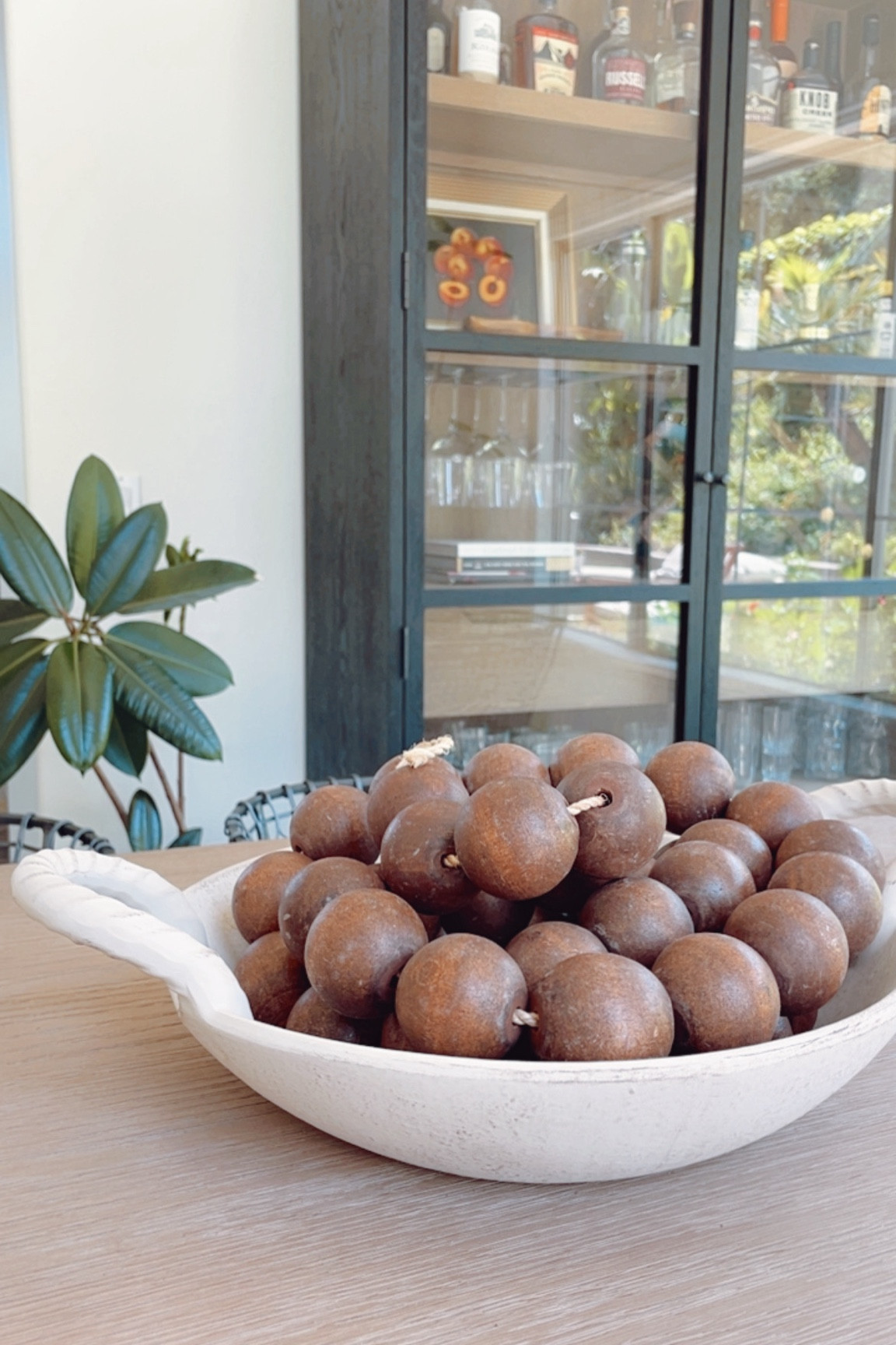 Linking several options for decorative beads in this post. They make great filler decor for a console table, coffee table or bookshelf. 

Here I’m using them as a centerpiece on my dining table. 👍🏻

#potteeybarn #homedecor 

#LTKStyleTip #LTKHome