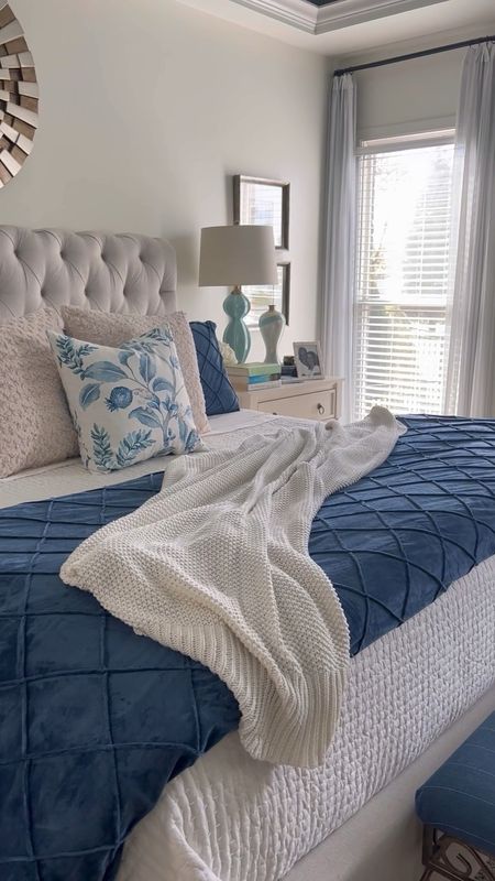 Create gorgeous, luxurious look in you bedroom this winter! Cozy bedding, velvet duvet, Pottery Barn Quilt, white pick-stitched quilt, cozy knit throw, blue and white bedroom

#LTKhome #LTKstyletip