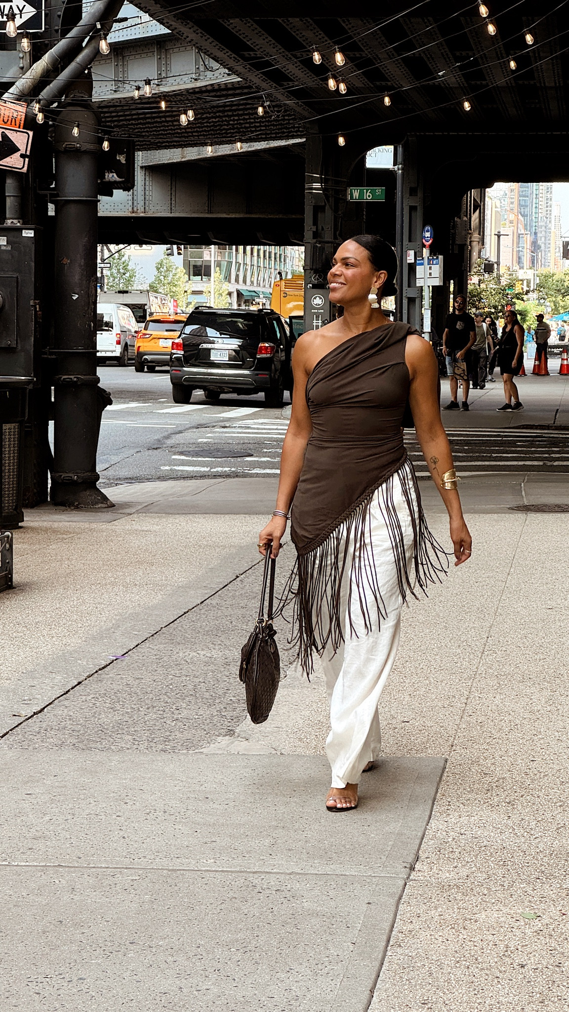 NYFW: wide leg linen pants, one shoulder fringe top, brown woven handbag, & clear heels! 

#LTKStyleTip #LTKNYFW #LTKOver40